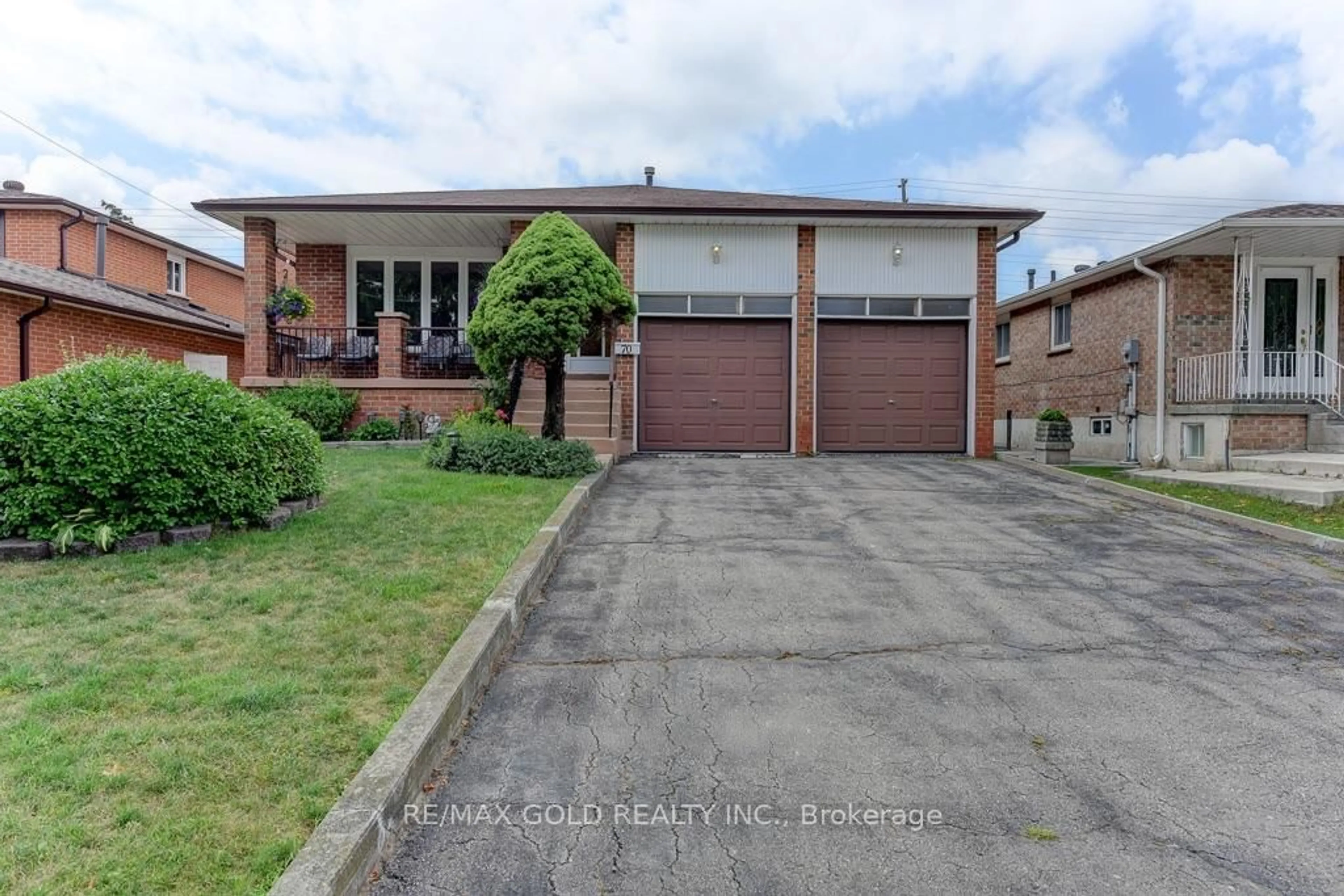 Home with brick exterior material, street for 70 Malcolm Cres, Brampton Ontario L6S 3C8
