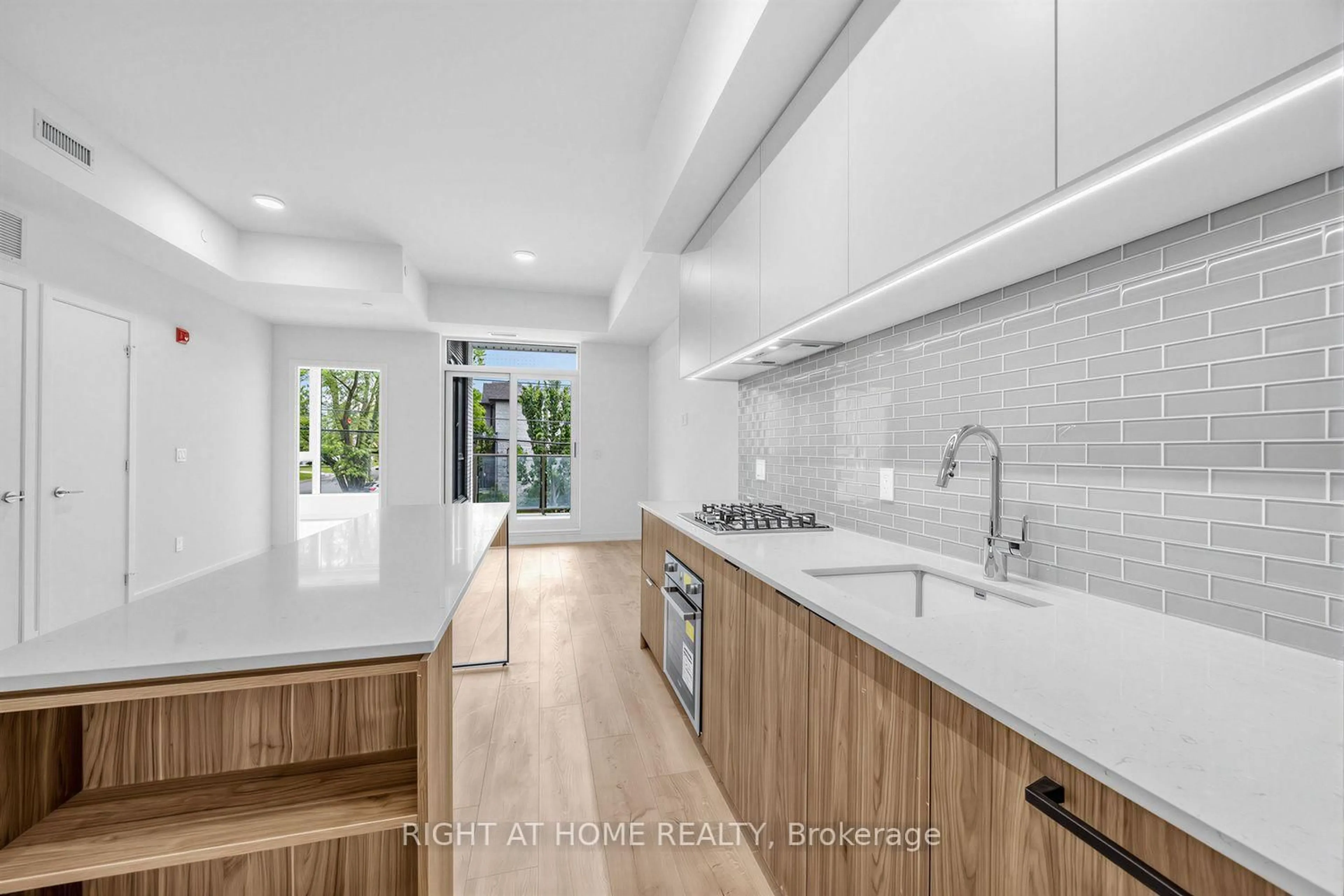Open concept kitchen, ceramic/tile floor for 722 Marlee Ave #207, Toronto Ontario M6B 3J7