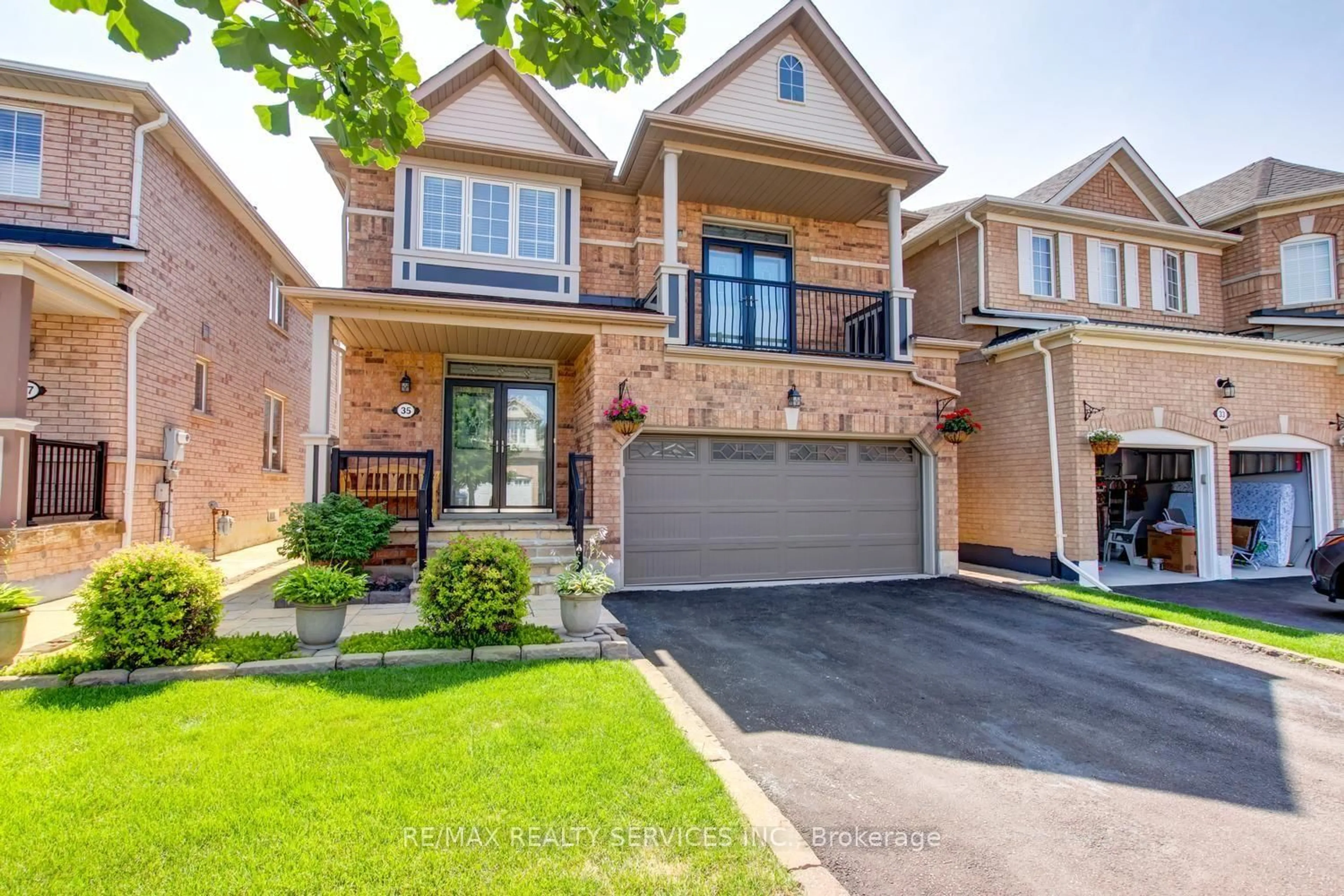 Home with brick exterior material, street for 35 Hardgate Cres, Brampton Ontario L7A 3V7