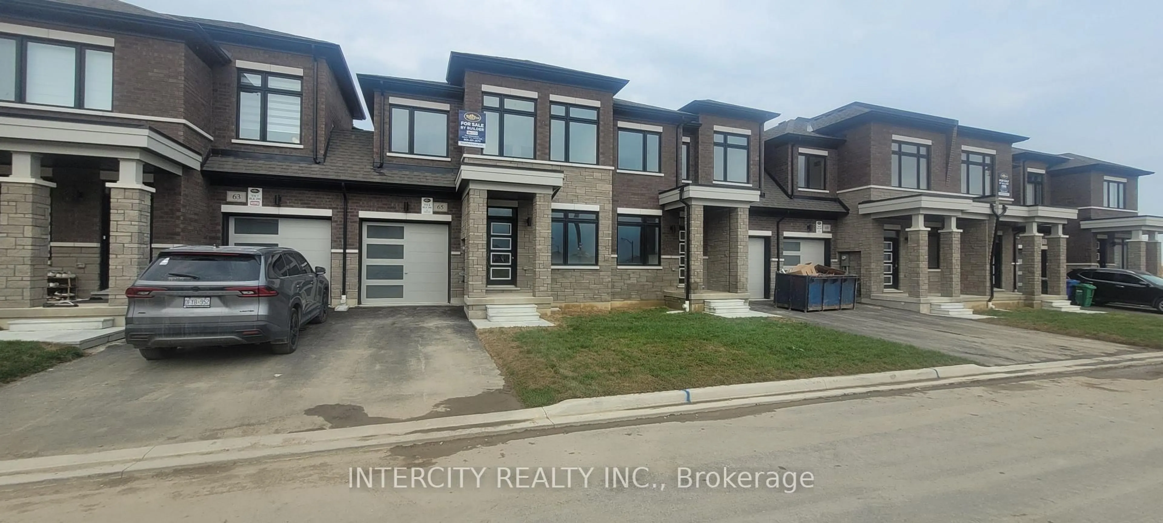 Home with brick exterior material, street for 65 Tapscott Cres, Brampton Ontario L6R 4G7