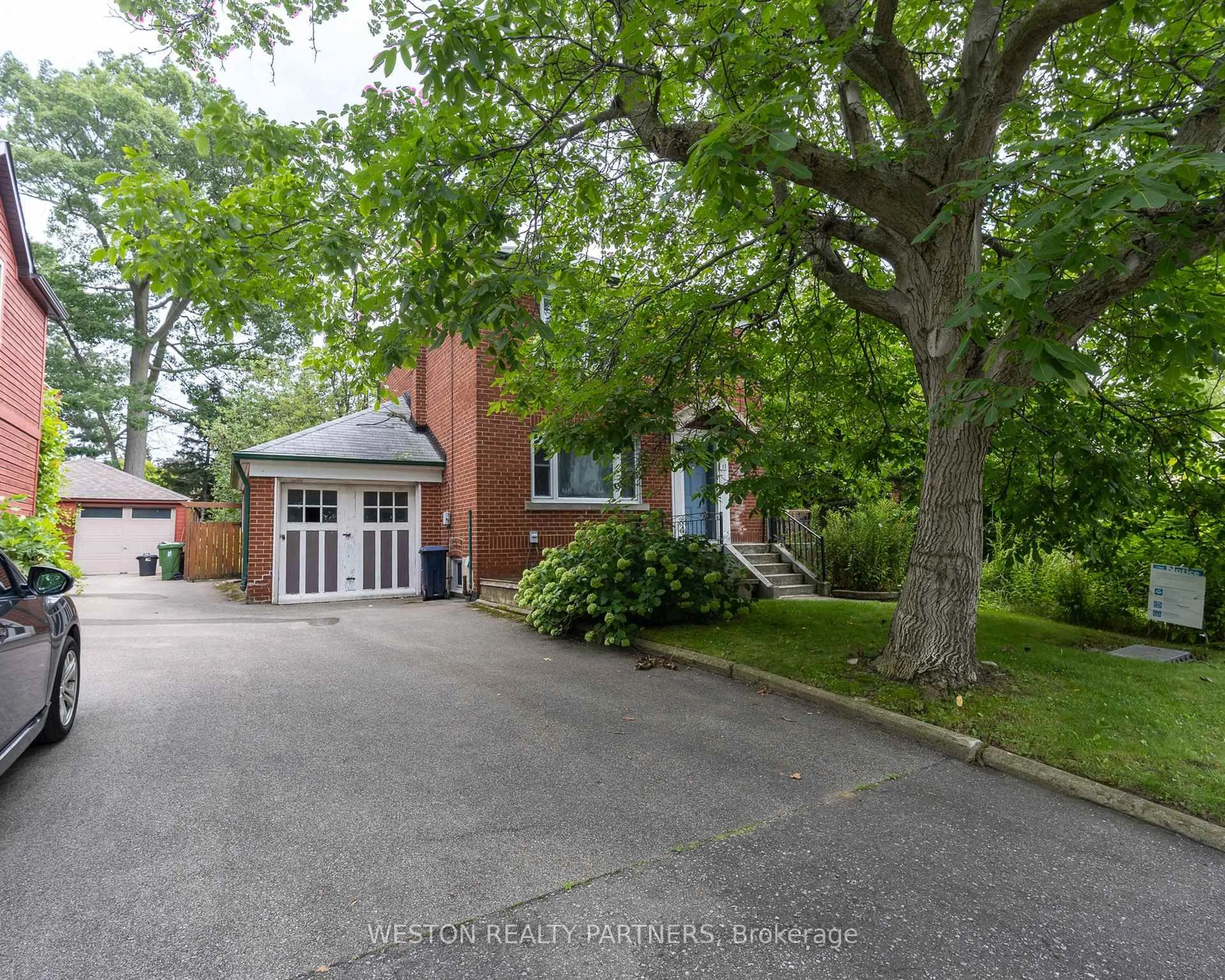 A pic from outside/outdoor area/front of a property/back of a property/a pic from drone, street for 11 Thirty-Sixth St, Toronto Ontario M8W 3K8