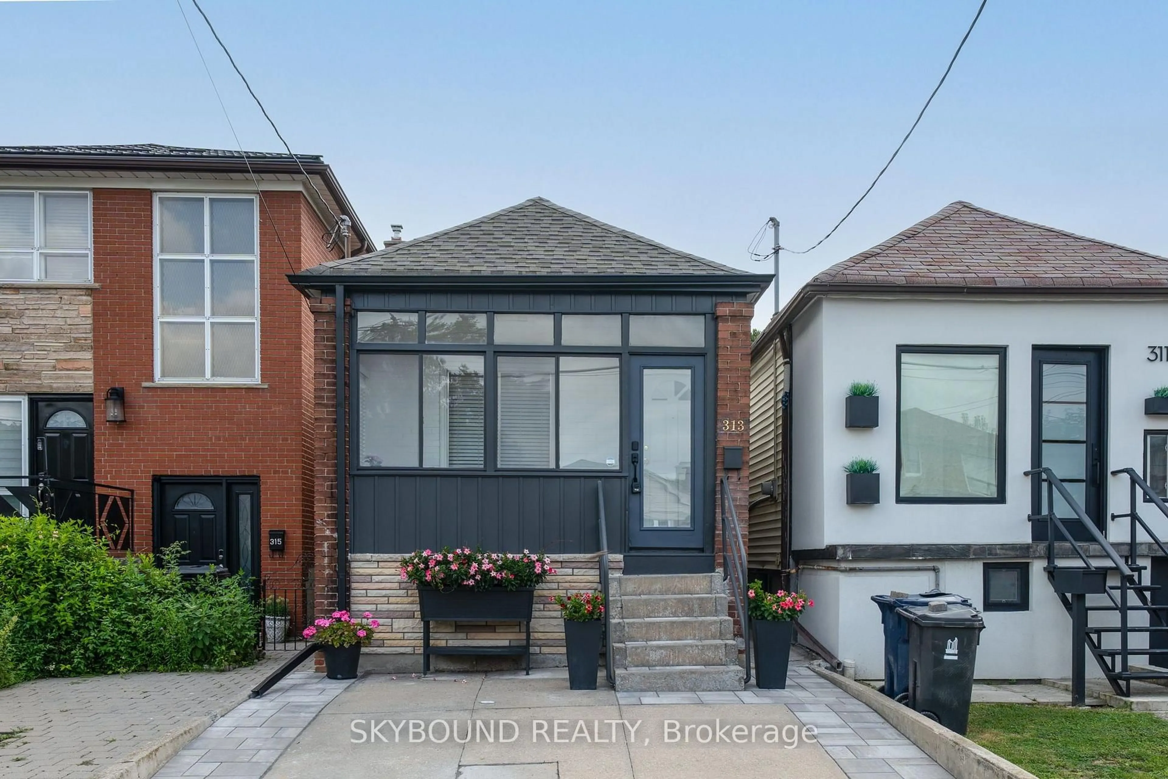 Home with brick exterior material, street for 313 Silverthorn Ave, Toronto Ontario M6N 3K5
