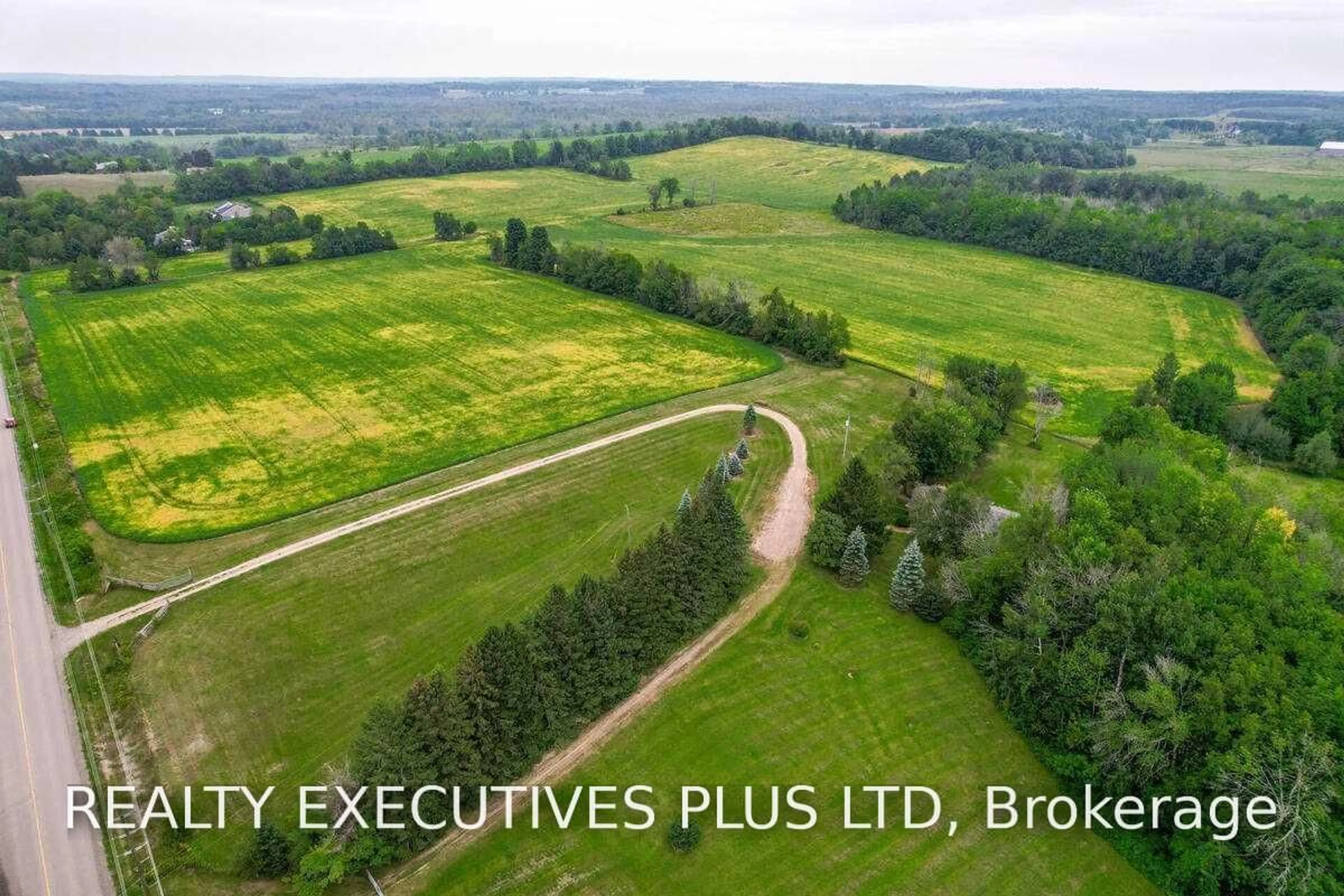 A pic from outside/outdoor area/front of a property/back of a property/a pic from drone, forest/trees view for 21170 Shaws Creek Rd, Caledon Ontario L7K 1K8