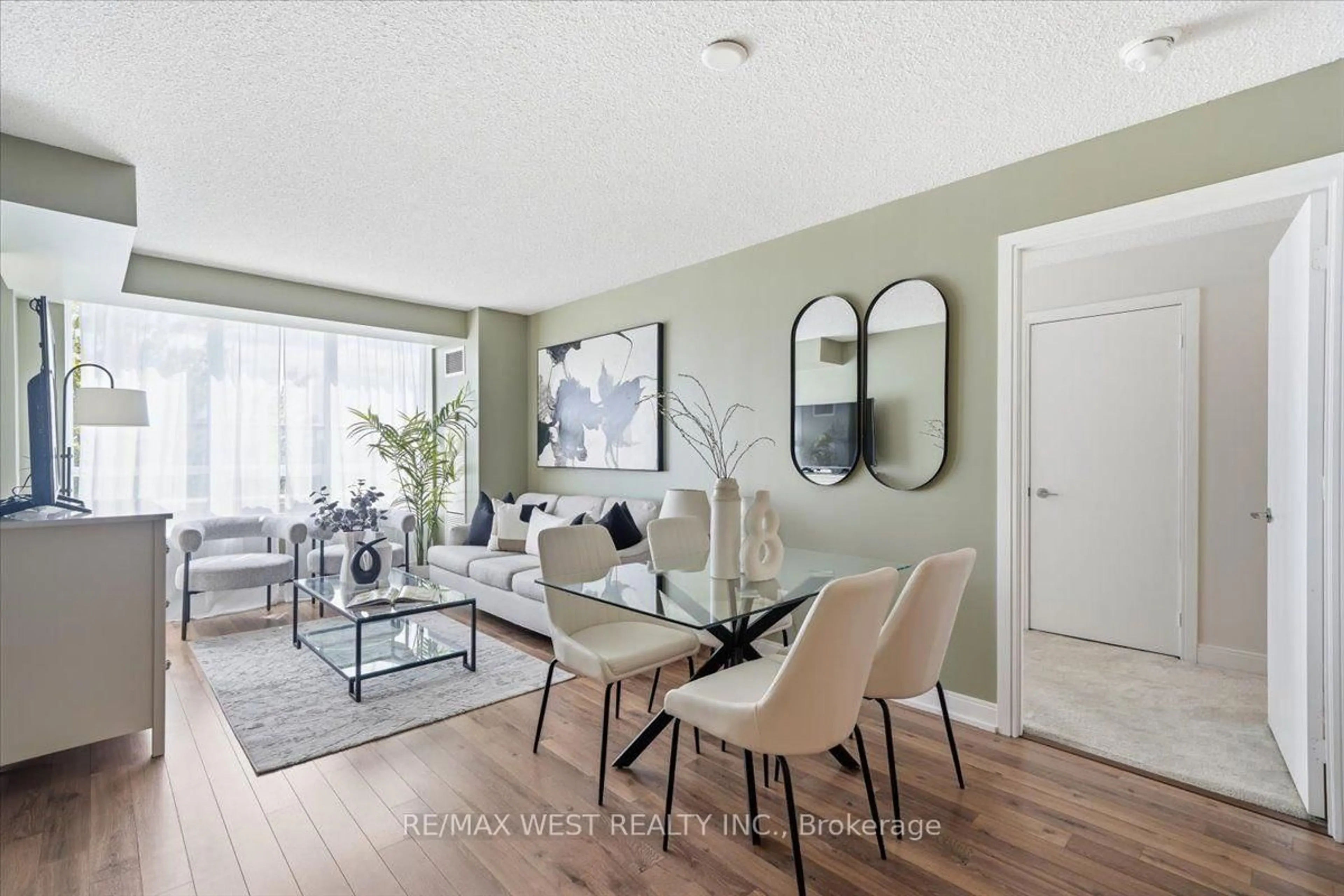Living room with furniture, unknown for 25 Viking Lane #250, Toronto Ontario M9B 0A1