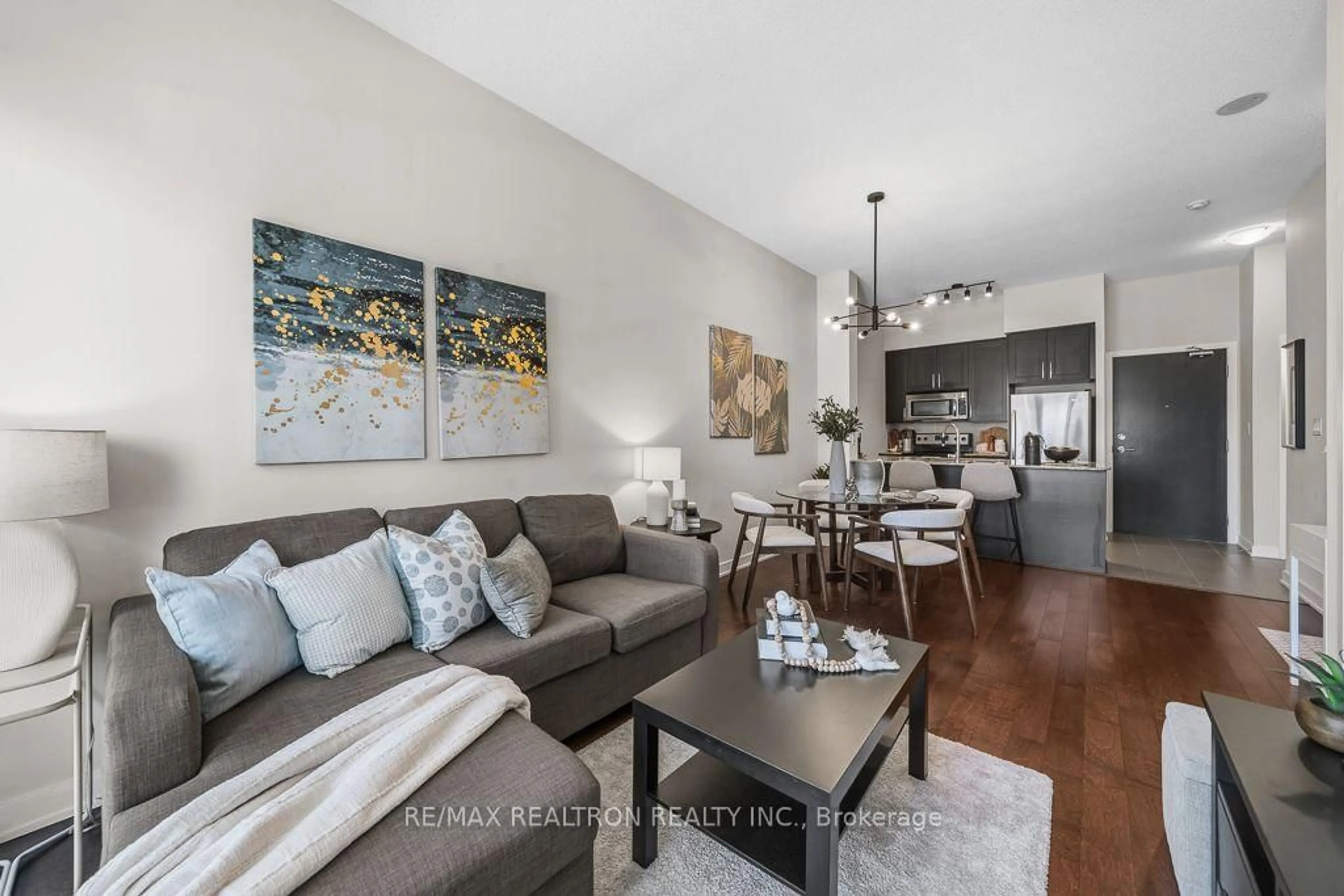 Living room with furniture, unknown for 4070 Confederation Pkwy #506, Mississauga Ontario L5B 0E9