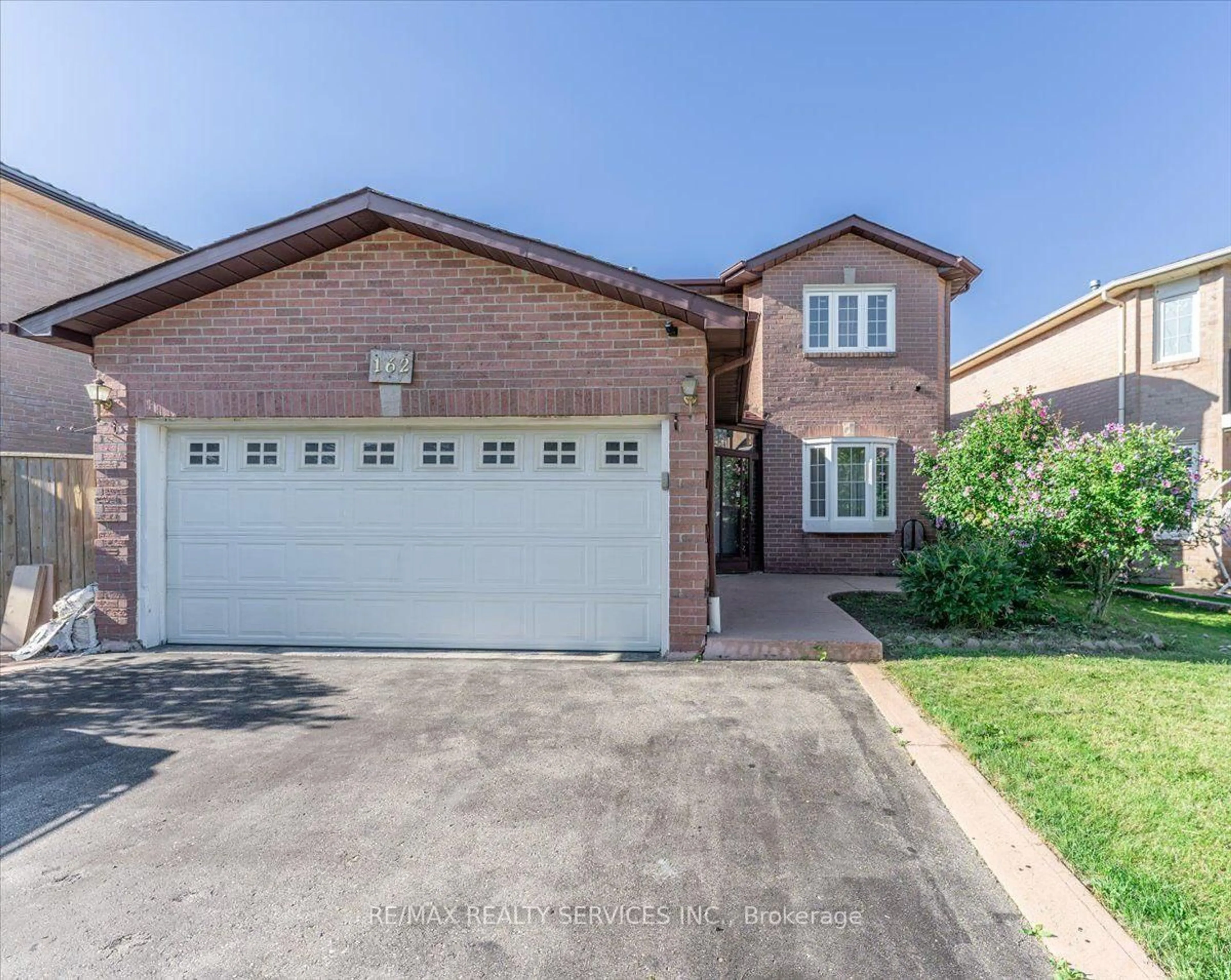 Home with brick exterior material, street for 162 Major William Sharpe Dr, Brampton Ontario L6X 4C3