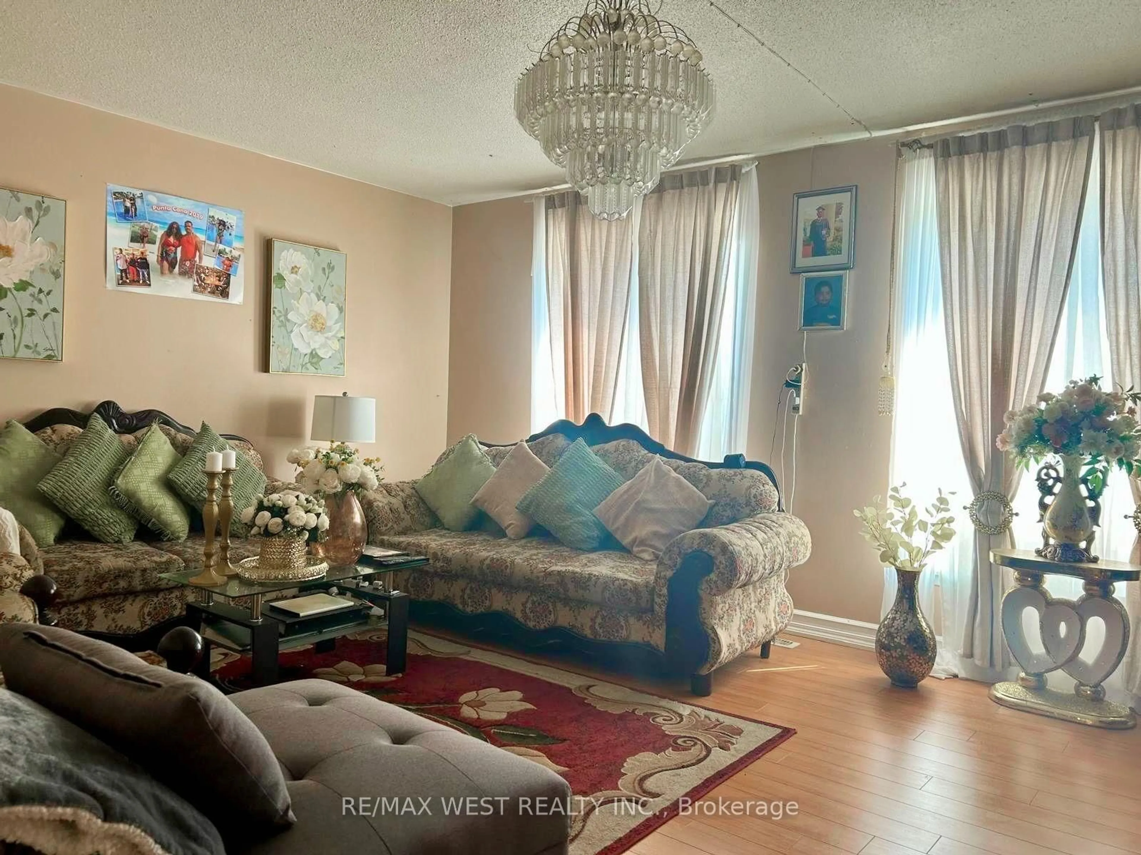 Living room with furniture, unknown for 6458 Finch Ave #134, Toronto Ontario M9V 1T4