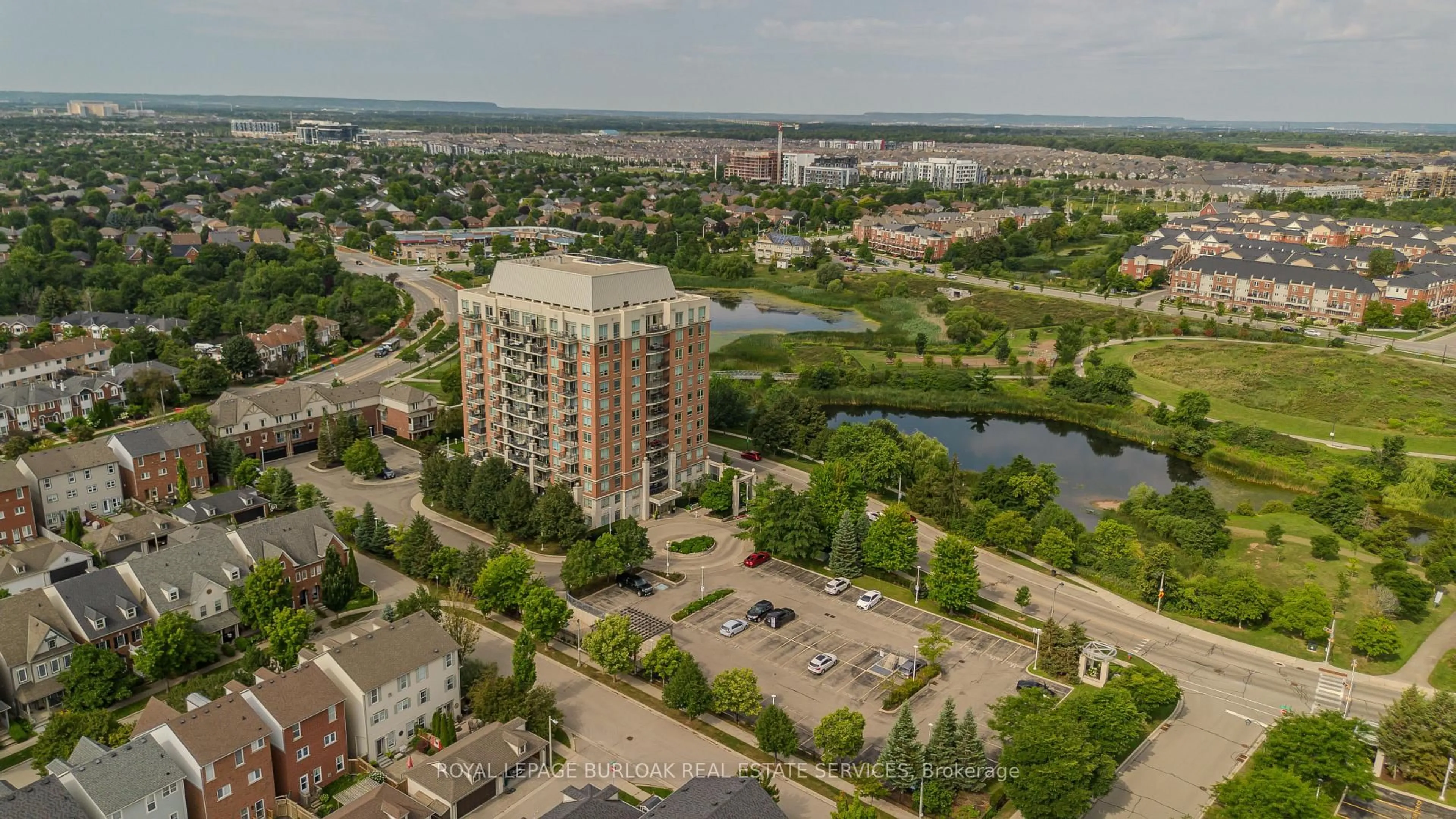 A pic from outside/outdoor area/front of a property/back of a property/a pic from drone, water/lake/river/ocean view for 2325 Central Park Dr #709, Oakville Ontario L6H 0E2