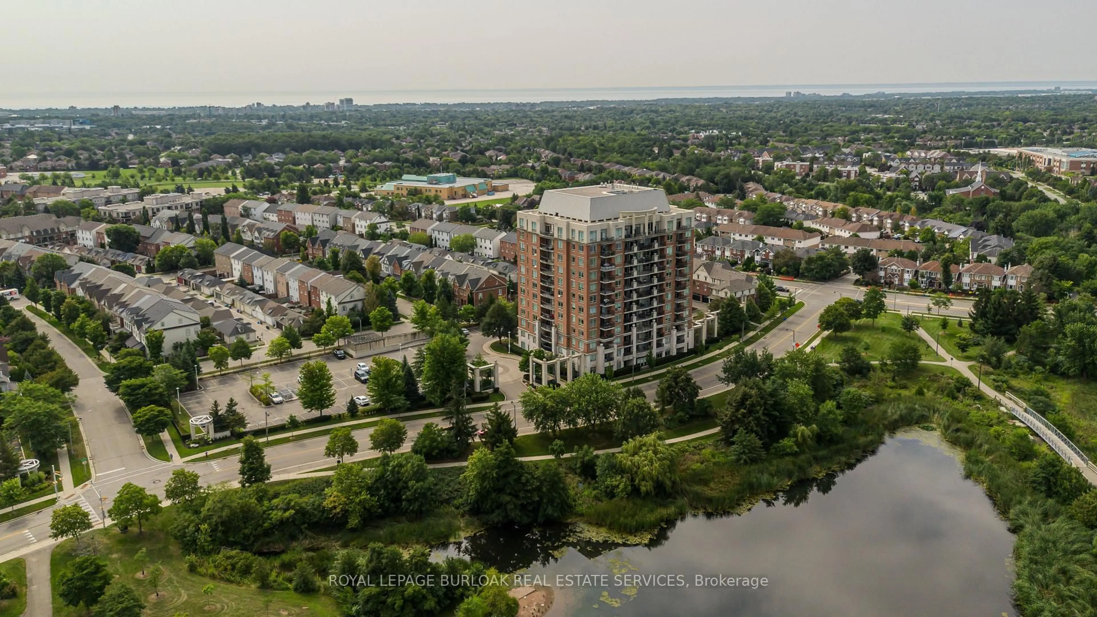 A pic from outside/outdoor area/front of a property/back of a property/a pic from drone, unknown for 2325 Central Park Dr #709, Oakville Ontario L6H 0E2
