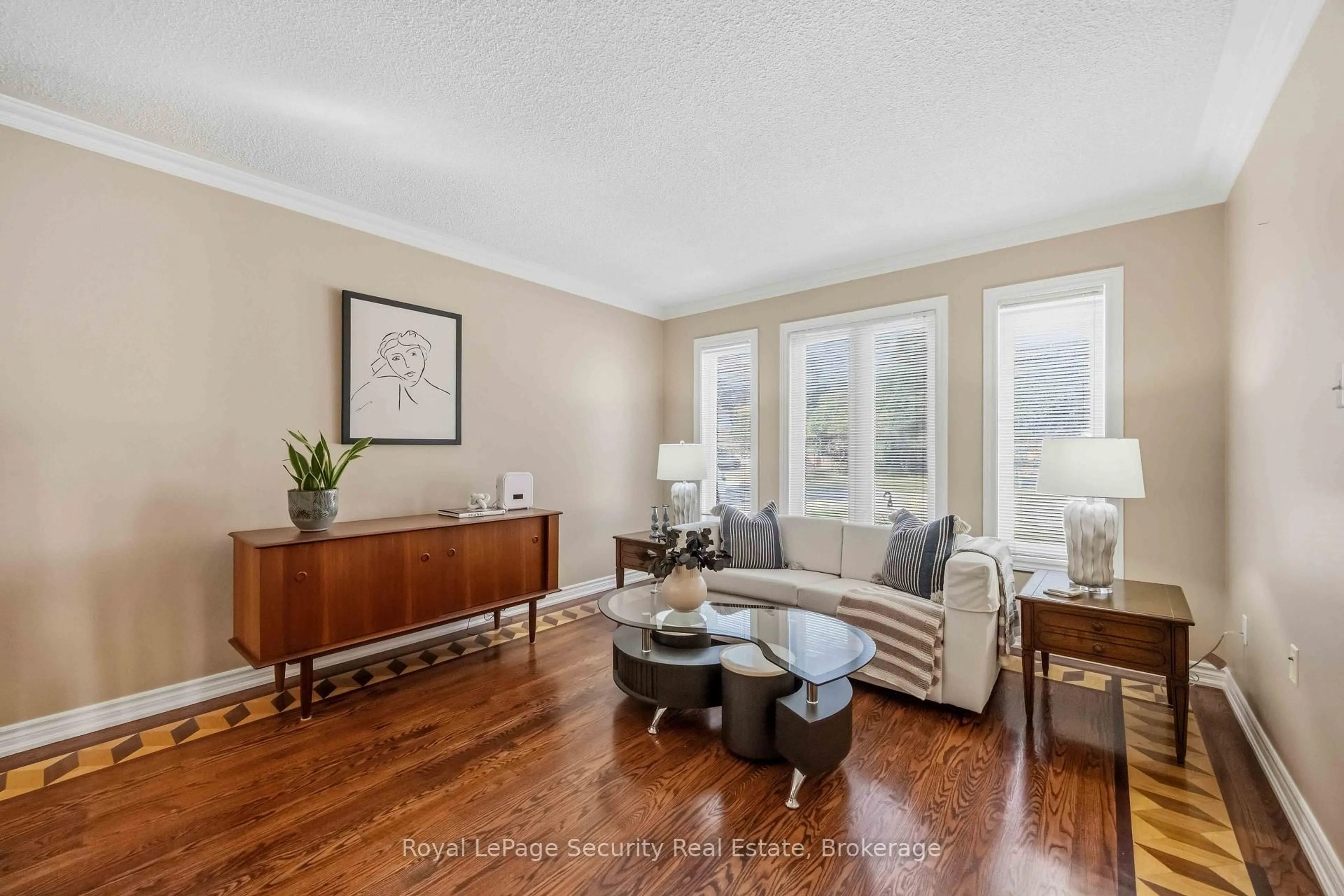Living room with furniture, wood/laminate floor for 46 Birchway Pl, Halton Hills Ontario L7J 2X7