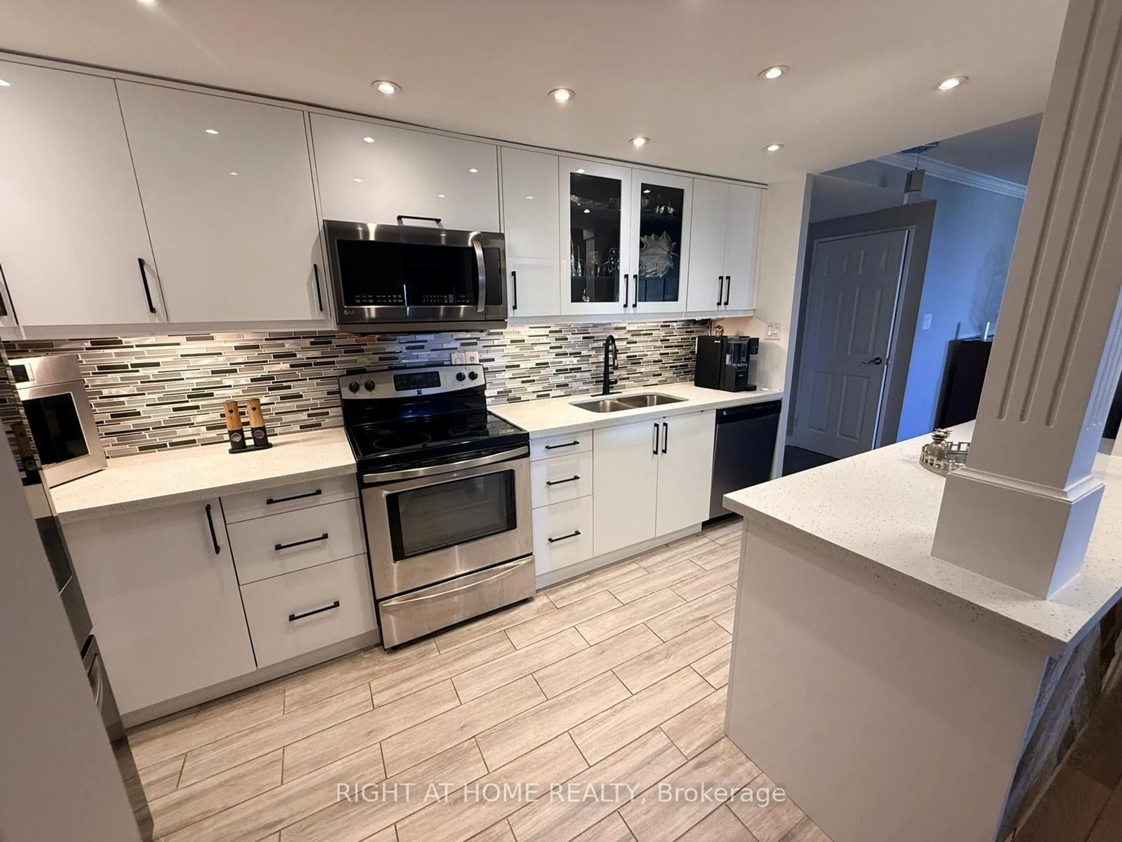 Open concept kitchen, ceramic/tile floor for 820 Burnhamthorpe Rd #1102, Toronto Ontario M9C 4W2