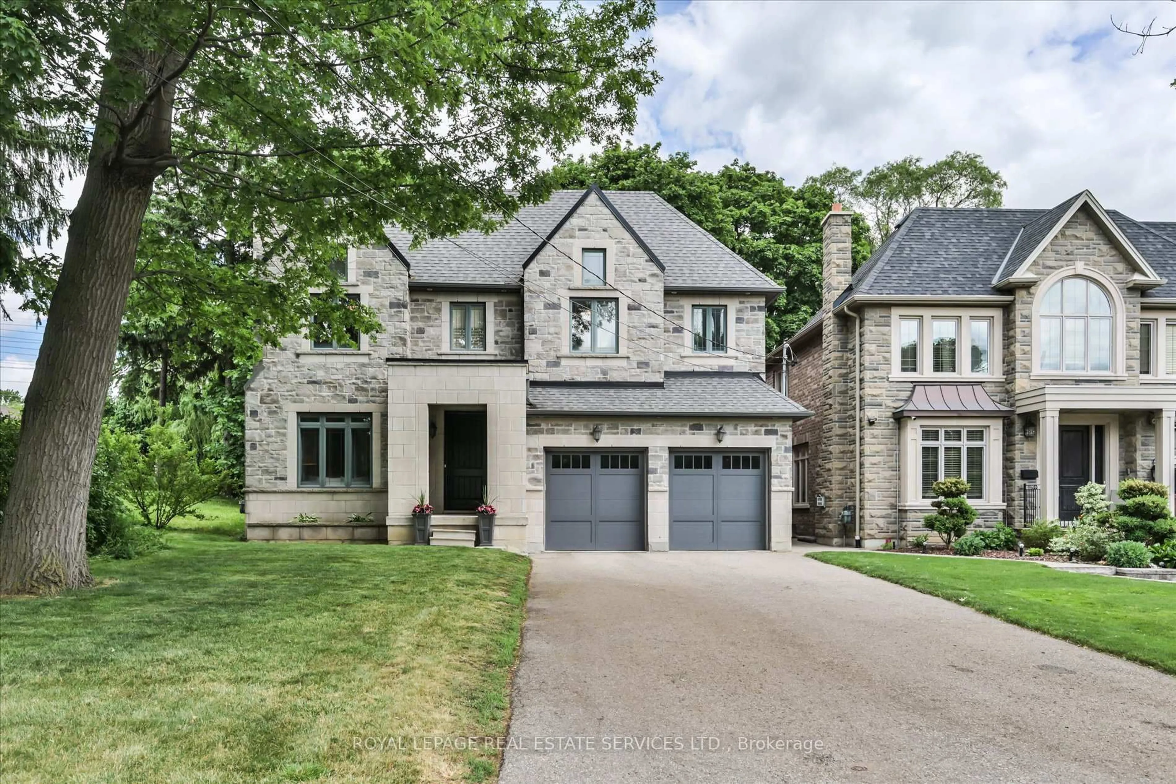 Home with brick exterior material, street for 439 Martin Grove Rd, Toronto Ontario M9B 4M1