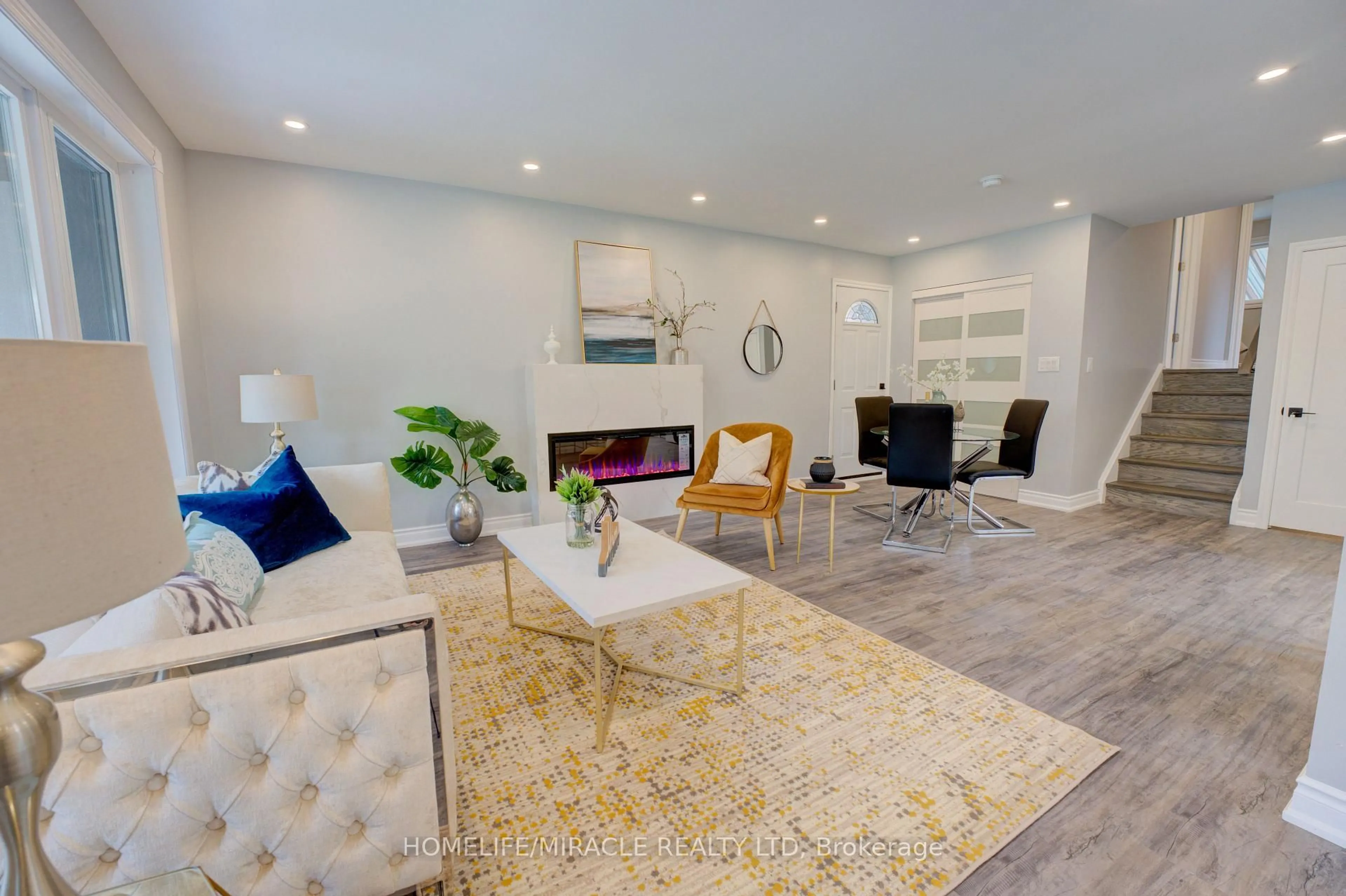 Living room with furniture, unknown for 85 Silverstone Dr, Toronto Ontario M9V 3G4