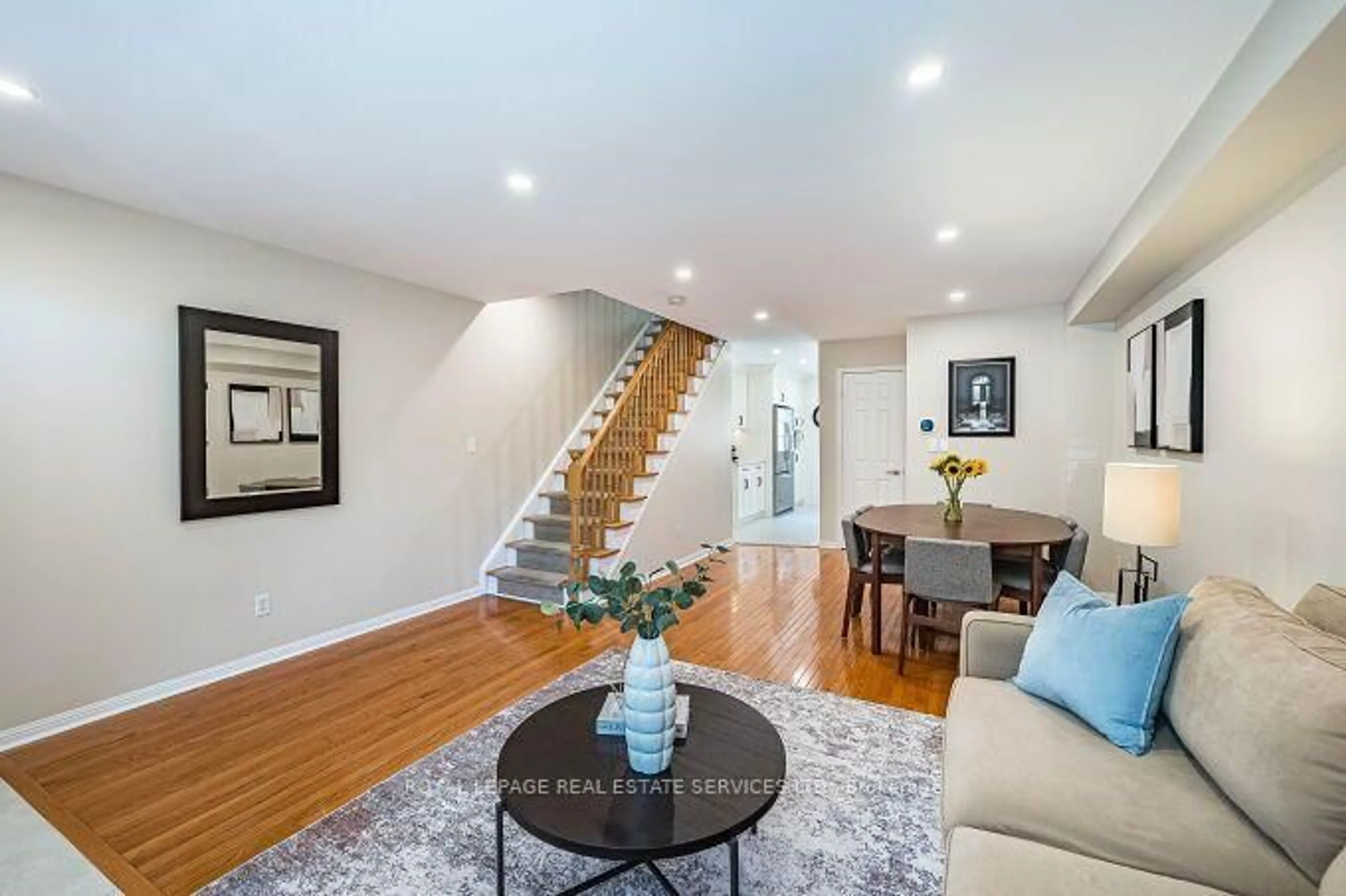 Living room with furniture, wood/laminate floor for 454 St Johns Rd, Toronto Ontario M6S 2L2