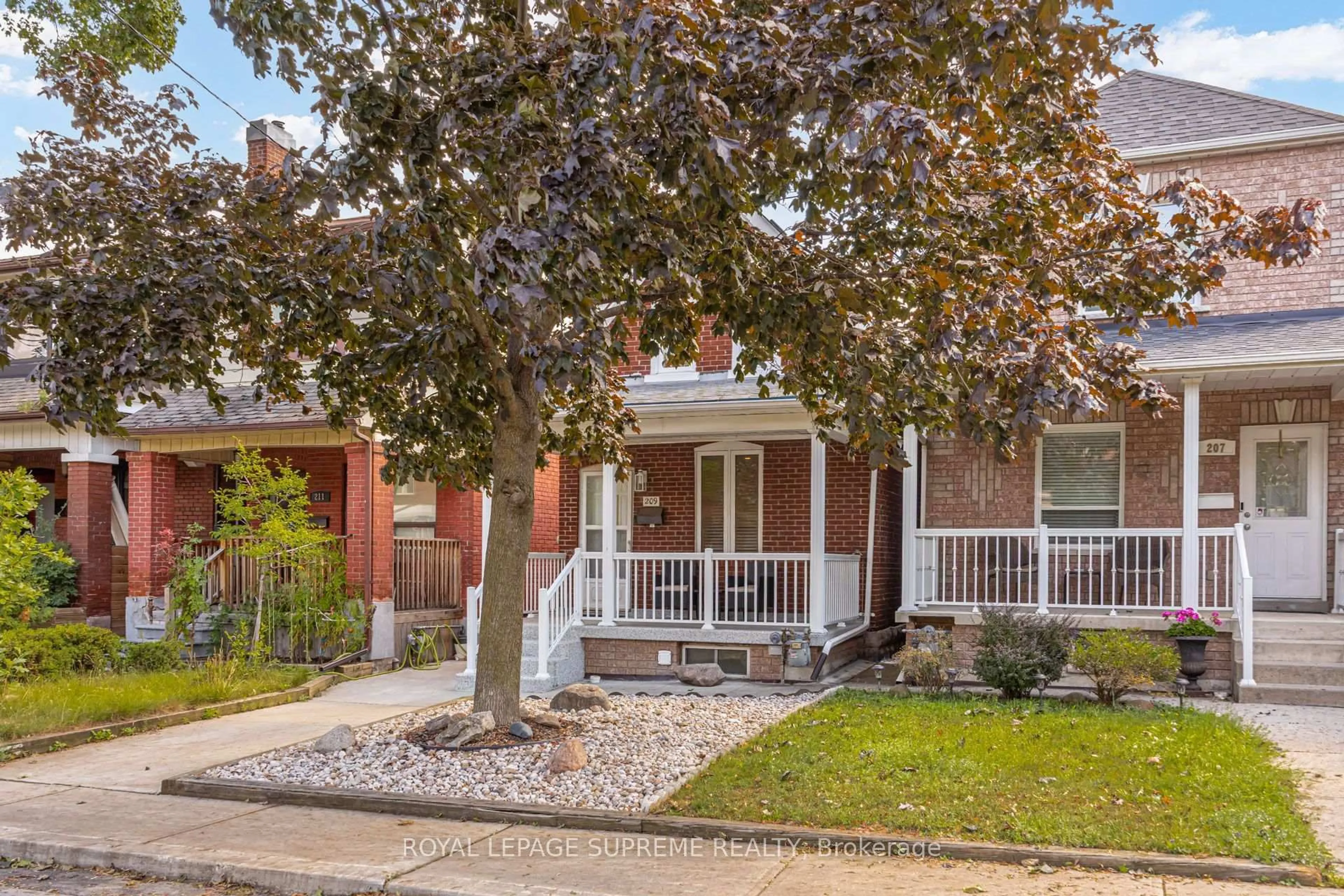 Home with brick exterior material, street for 209 Boon Ave, Toronto Ontario M6E 3Z7