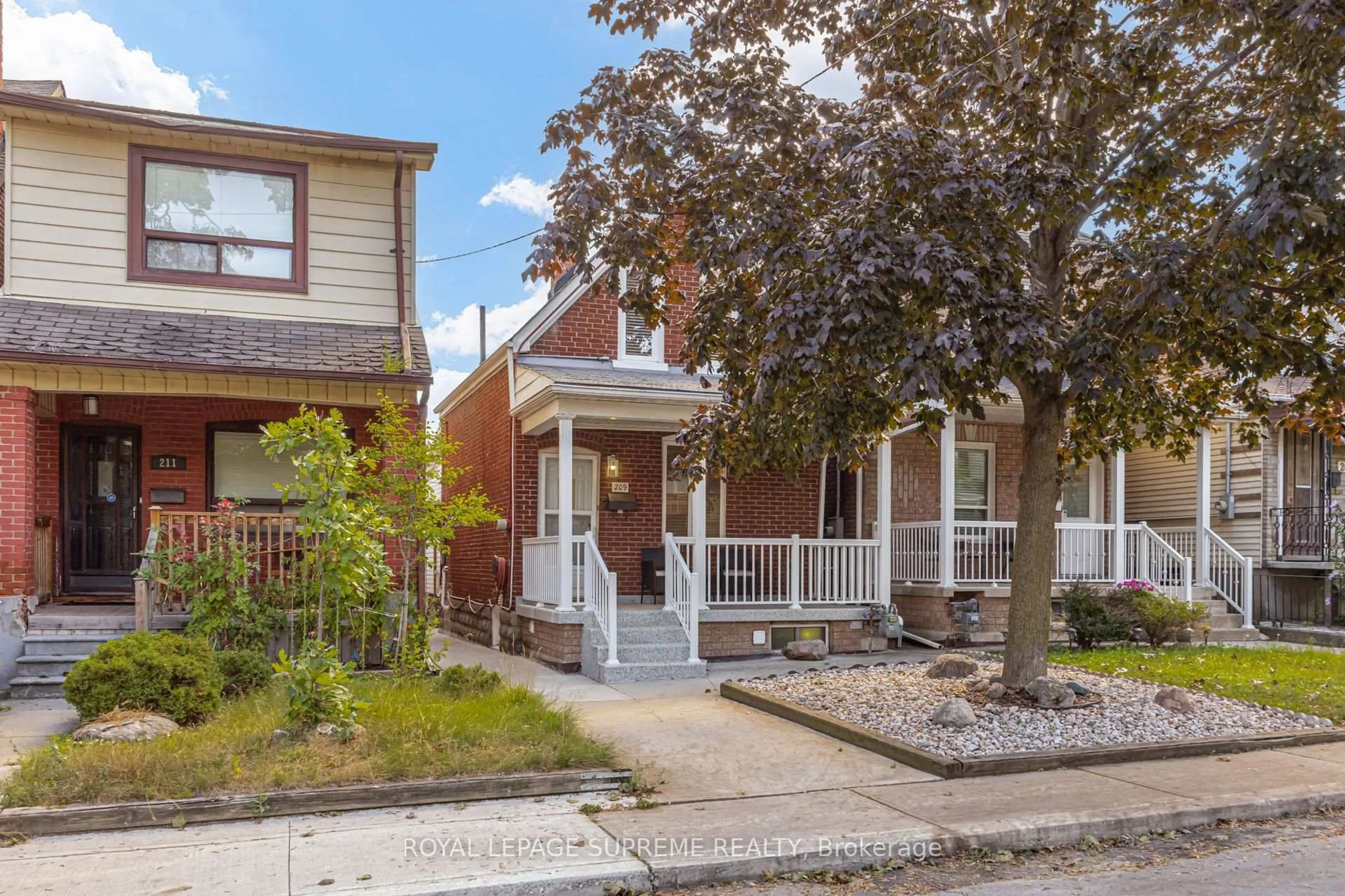 Home with brick exterior material, street for 209 Boon Ave, Toronto Ontario M6E 3Z7