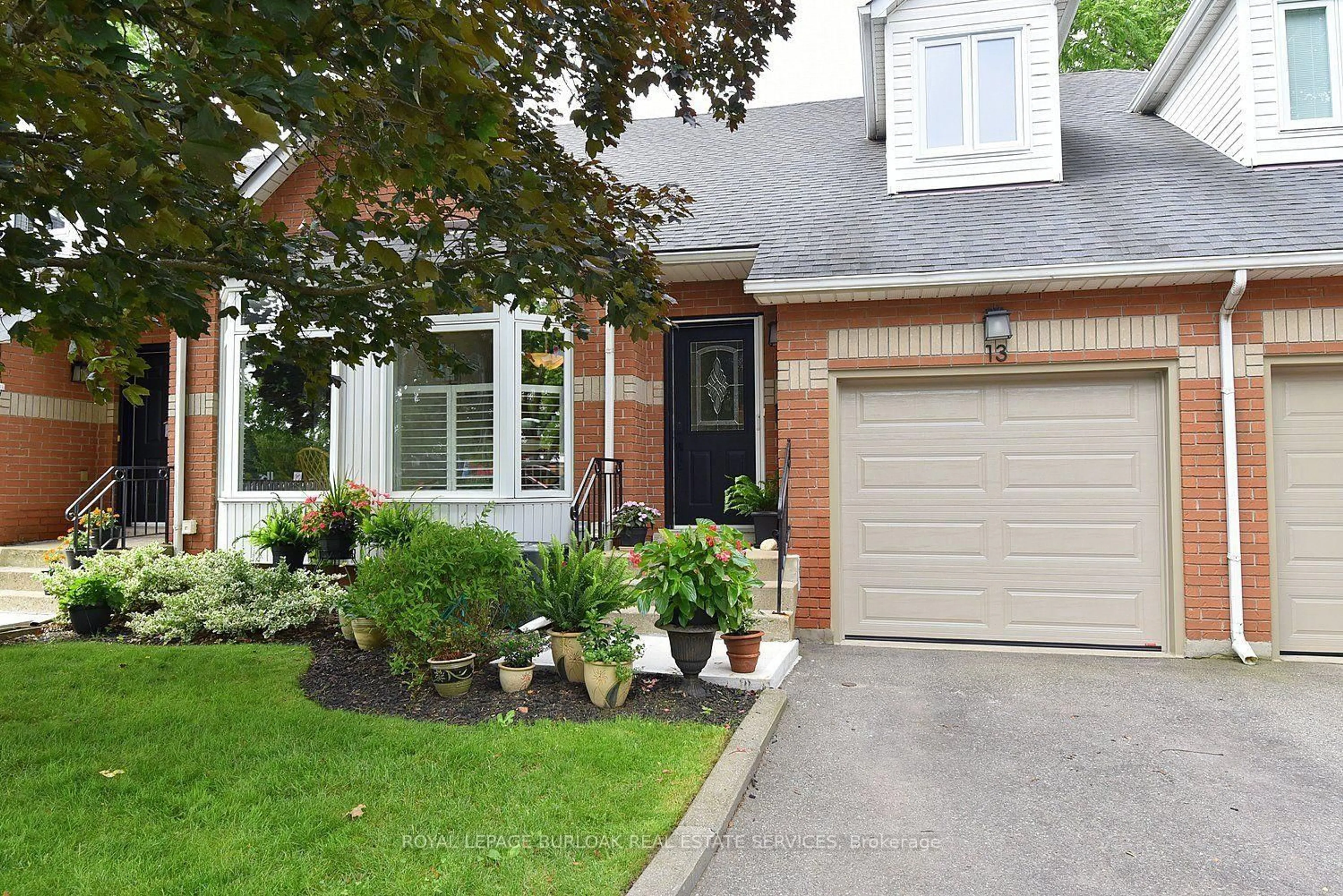Home with brick exterior material, street for 476 Walkers Line #13, Burlington Ontario L7N 2E2