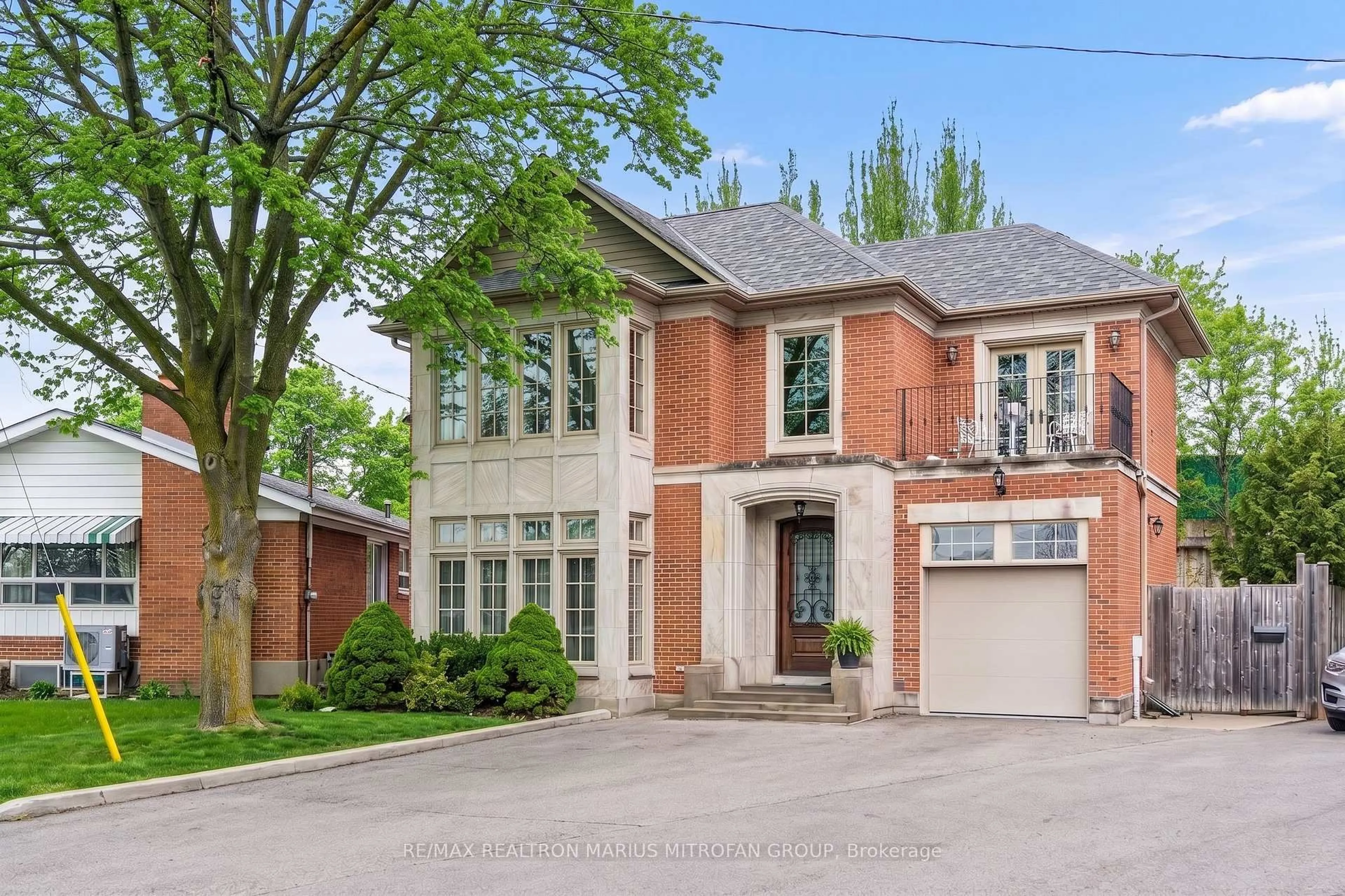 Home with brick exterior material, street for 7 Rollins Pl, Toronto Ontario M9B 3Y4