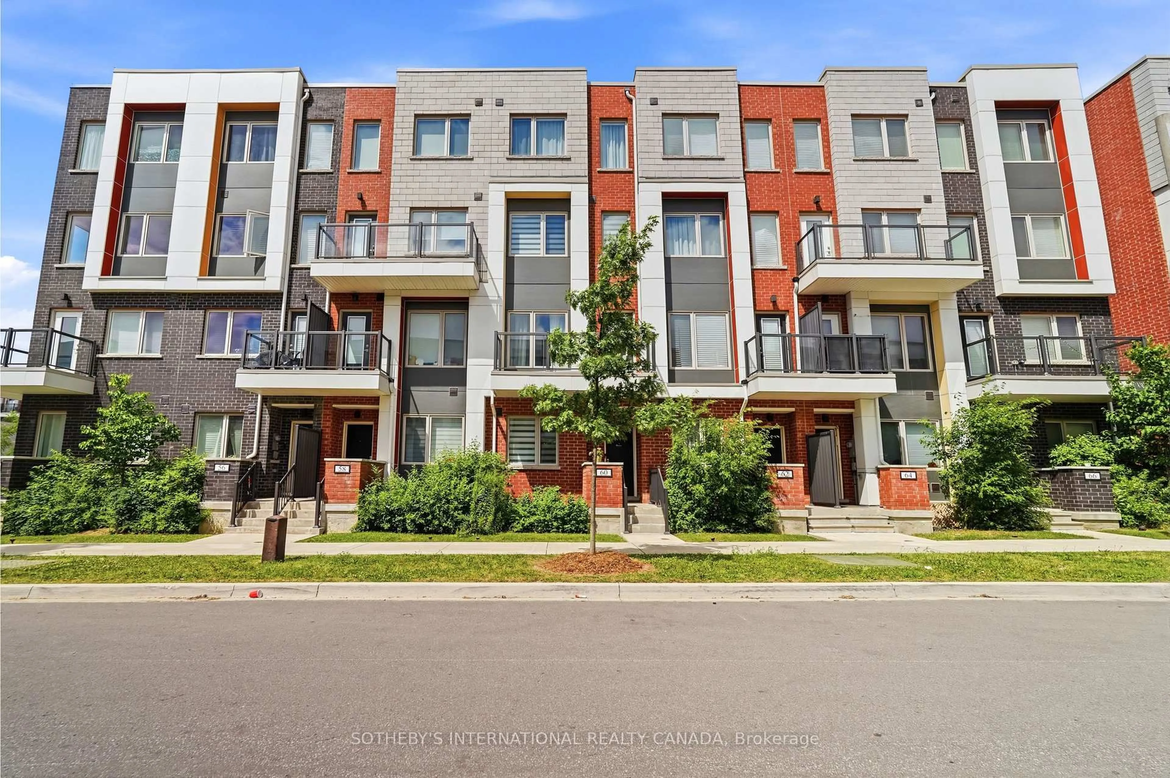 Home with brick exterior material, street for 60 William Duncan Rd, Toronto Ontario M3K 0C5