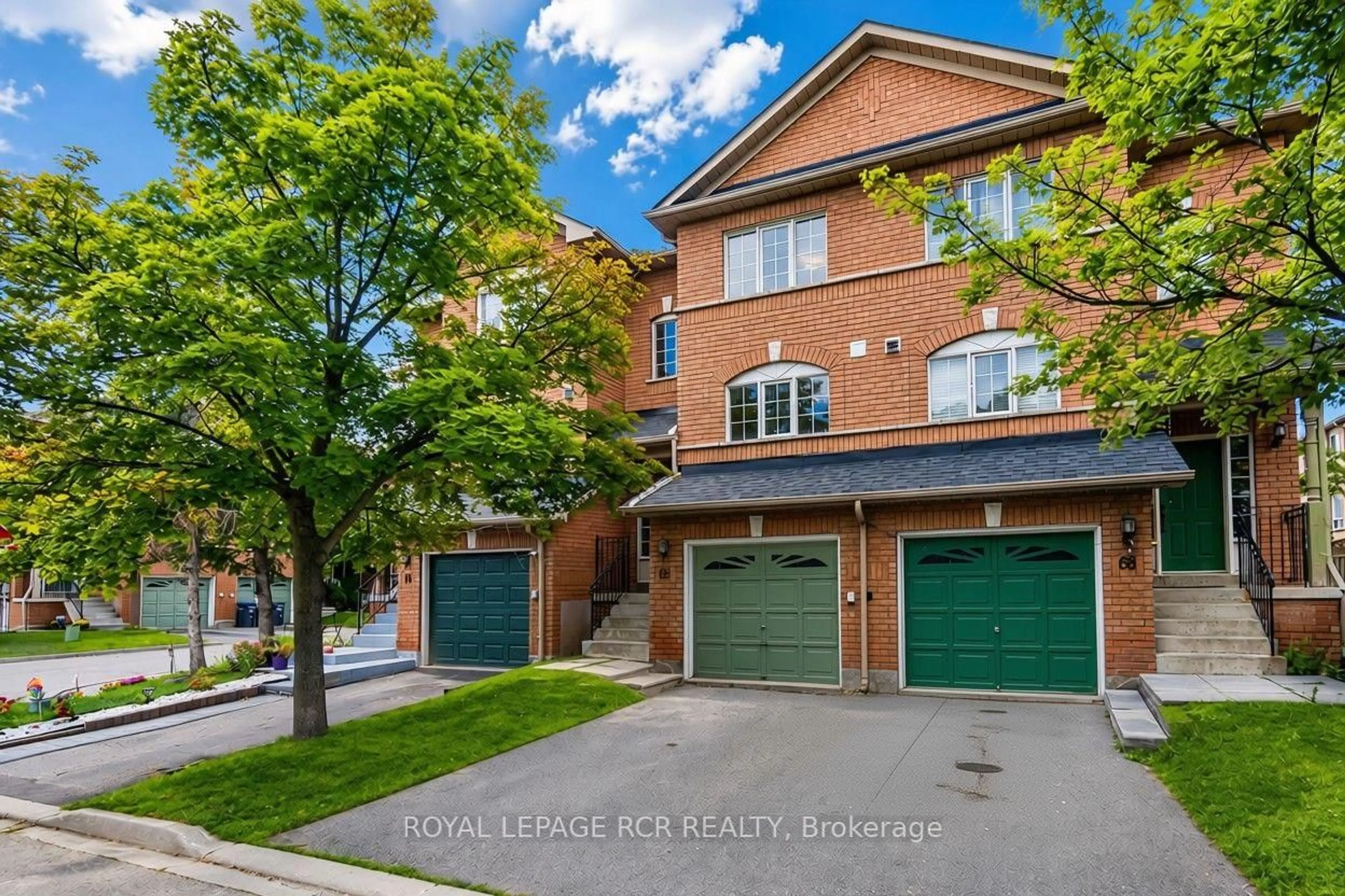 Home with brick exterior material, street for 65 Brickyard Way #66, Brampton Ontario L6V 4M2