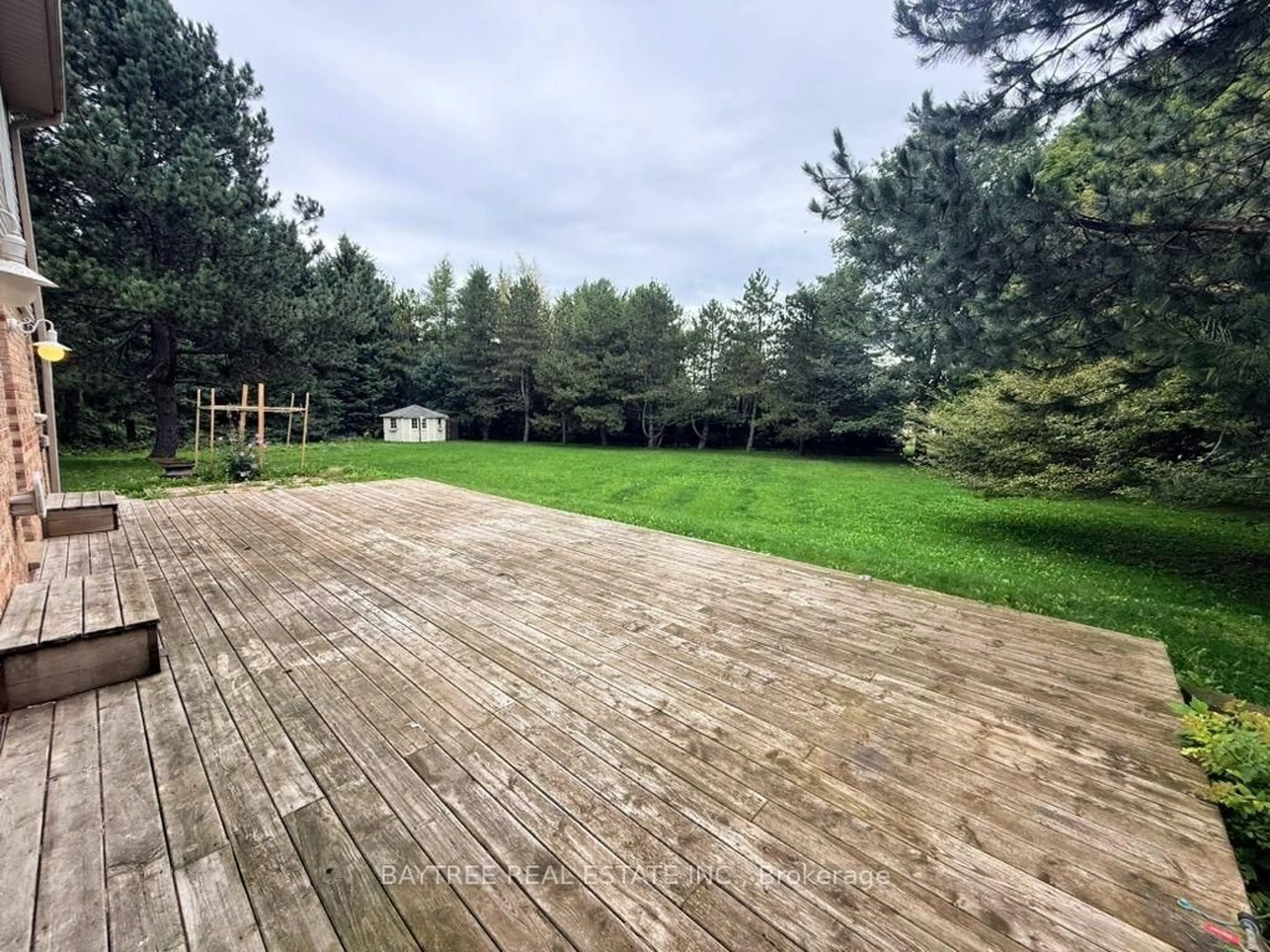 A pic from outside/outdoor area/front of a property/back of a property/a pic from drone, forest/trees view for 52 Autumn Dr, Caledon Ontario L7K 0T7