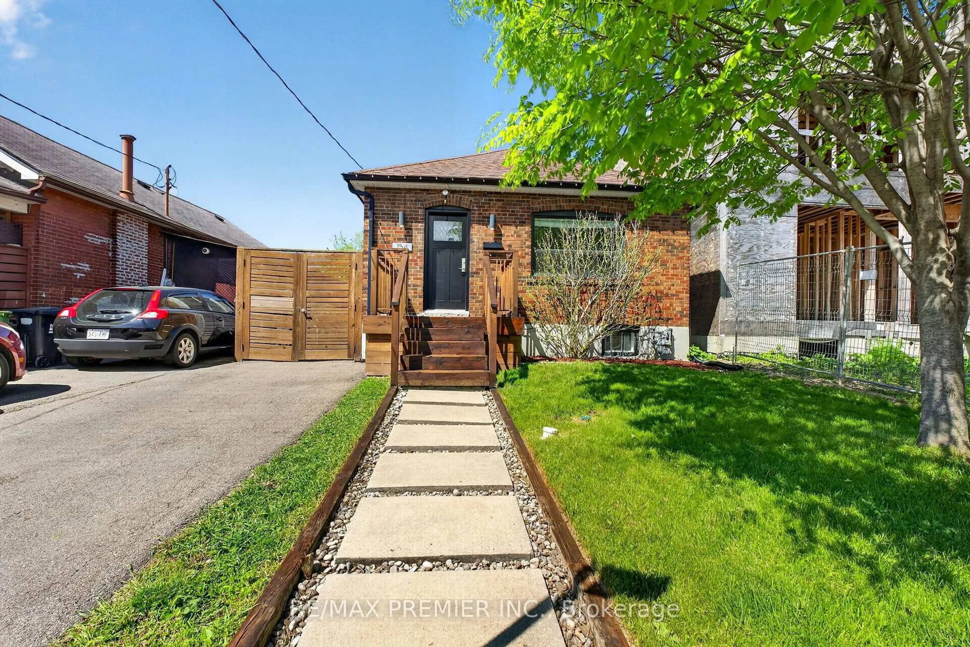Home with brick exterior material, street for 154 Fifth St, Toronto Ontario M8V 2C7