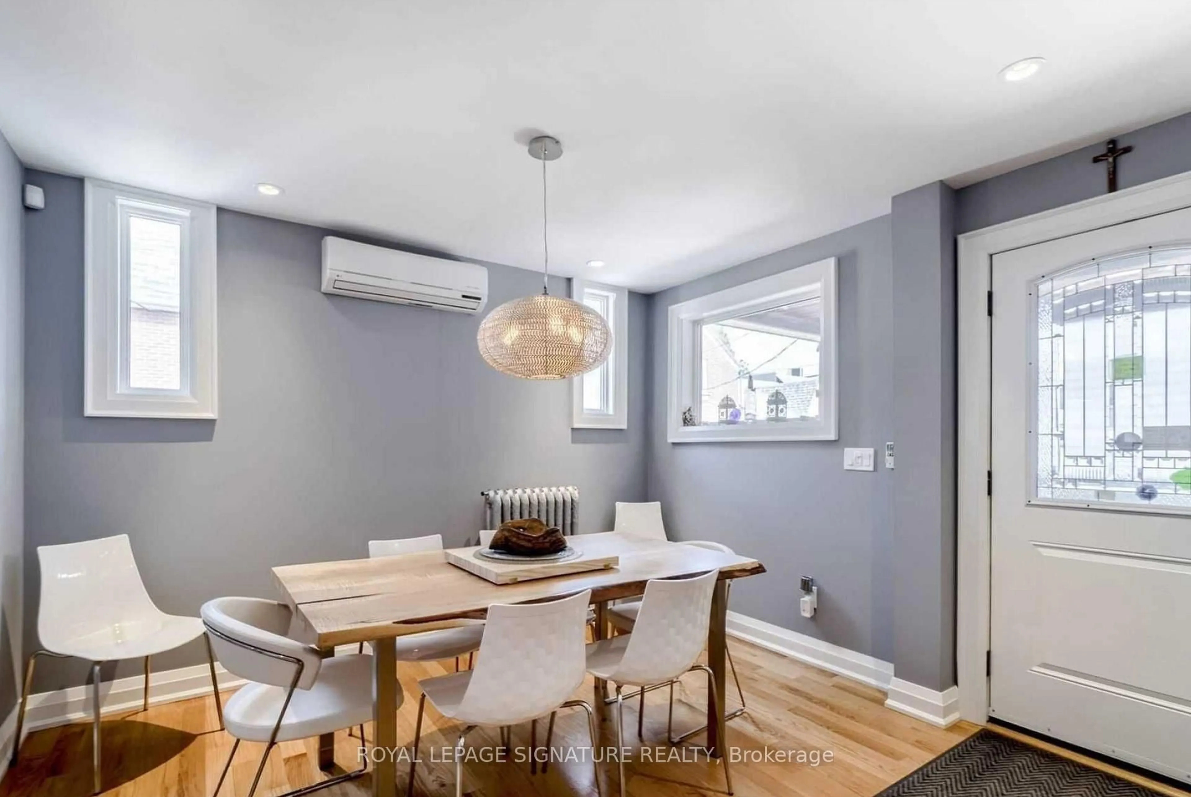 Dining room, wood/laminate floor for 23 Abbs St, Toronto Ontario M6K 1M5