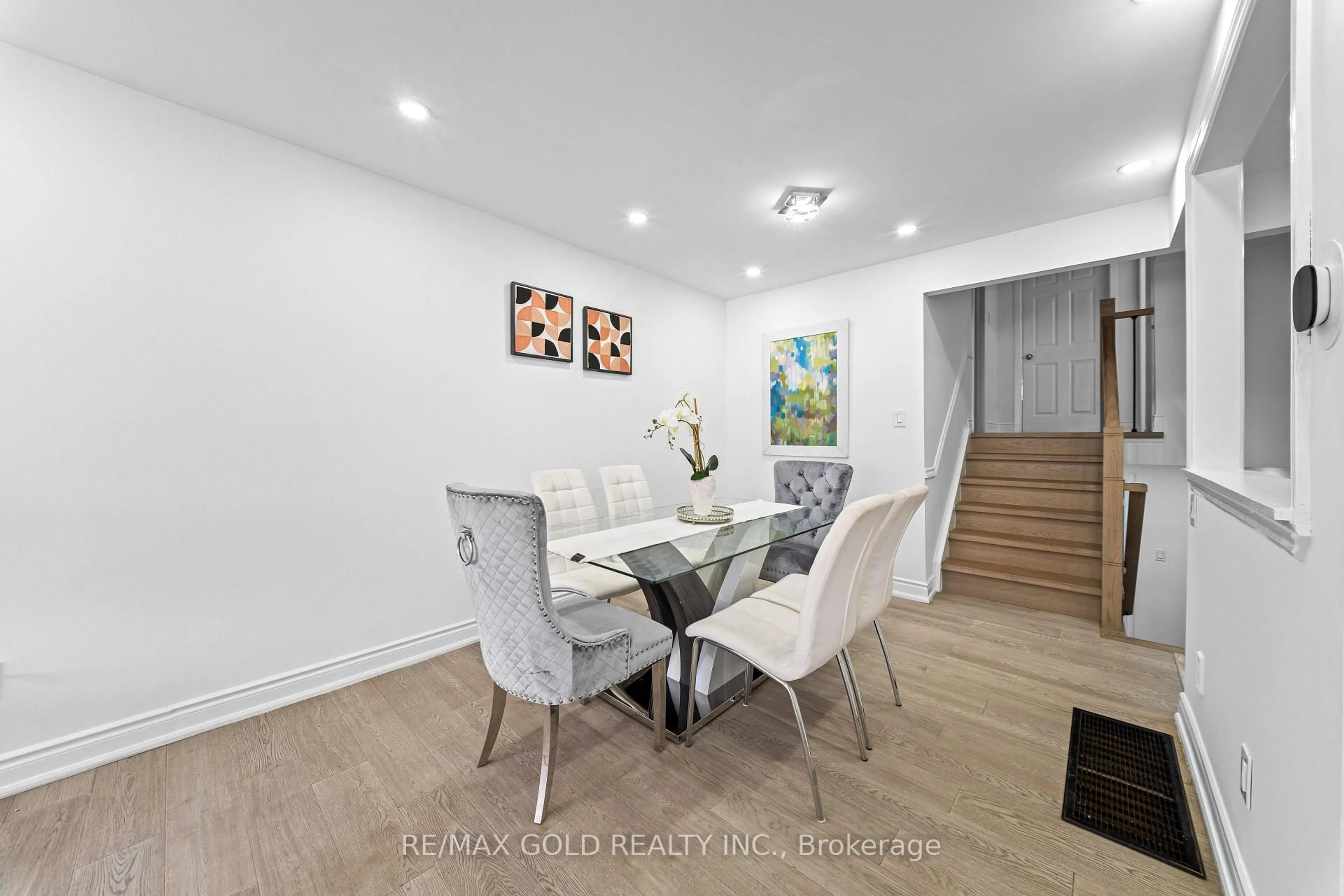 Dining room, wood/laminate floor for 88 Goldcrest Rd, Brampton Ontario L6S 1G8