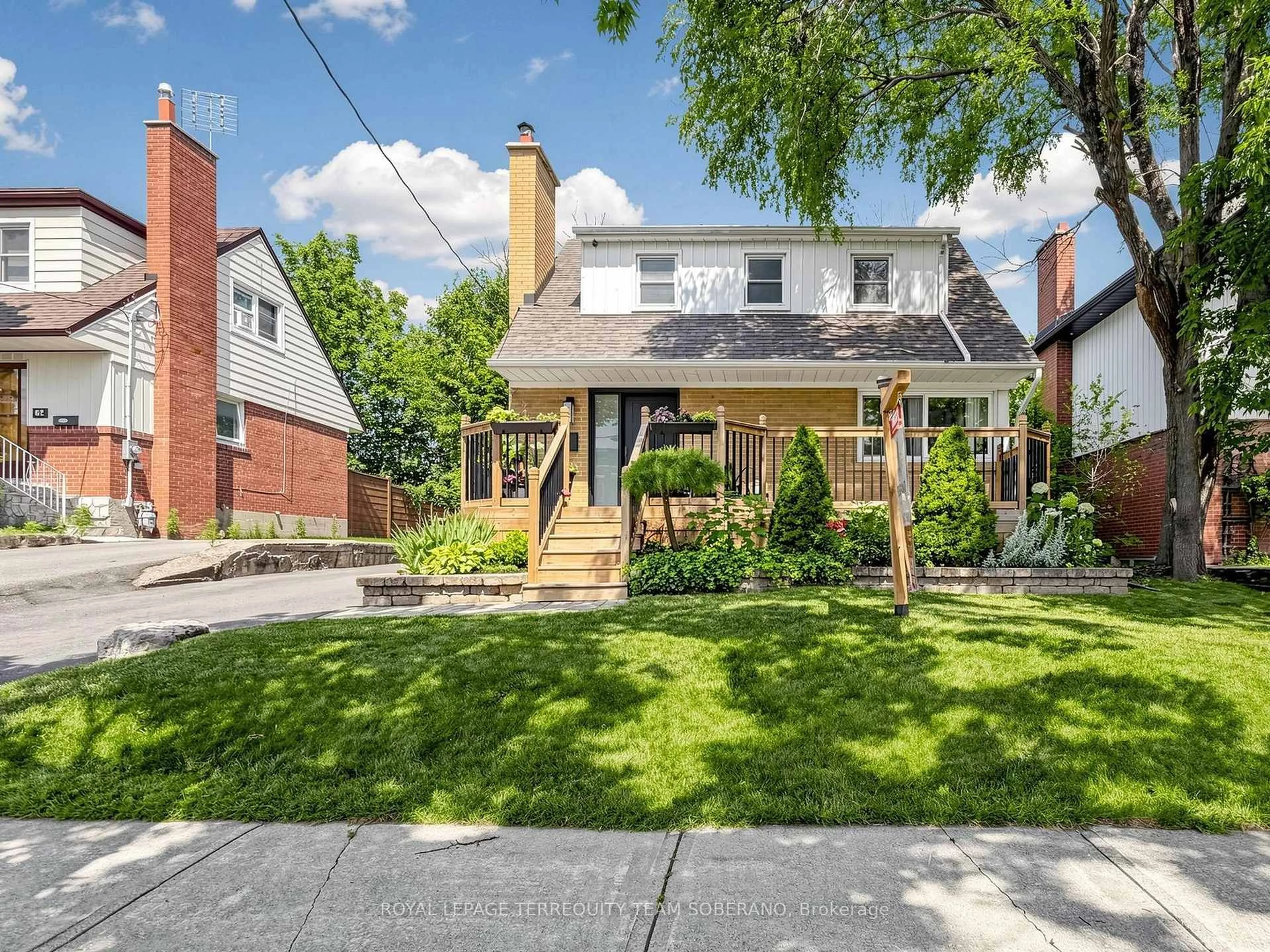 Home with brick exterior material, street for 64 Clearbrooke Circ, Toronto Ontario M9W 2E5