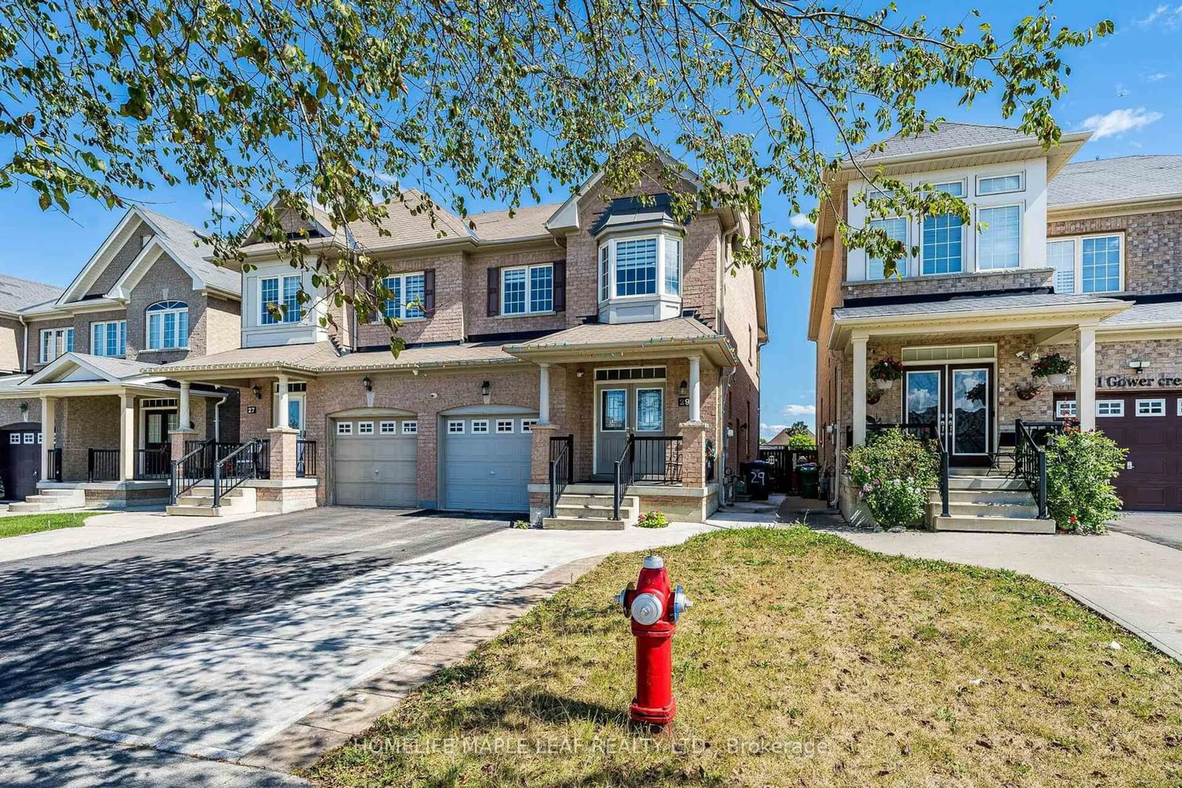 Home with brick exterior material, street for 29 Gower Cres, Brampton Ontario L6R 0Y1