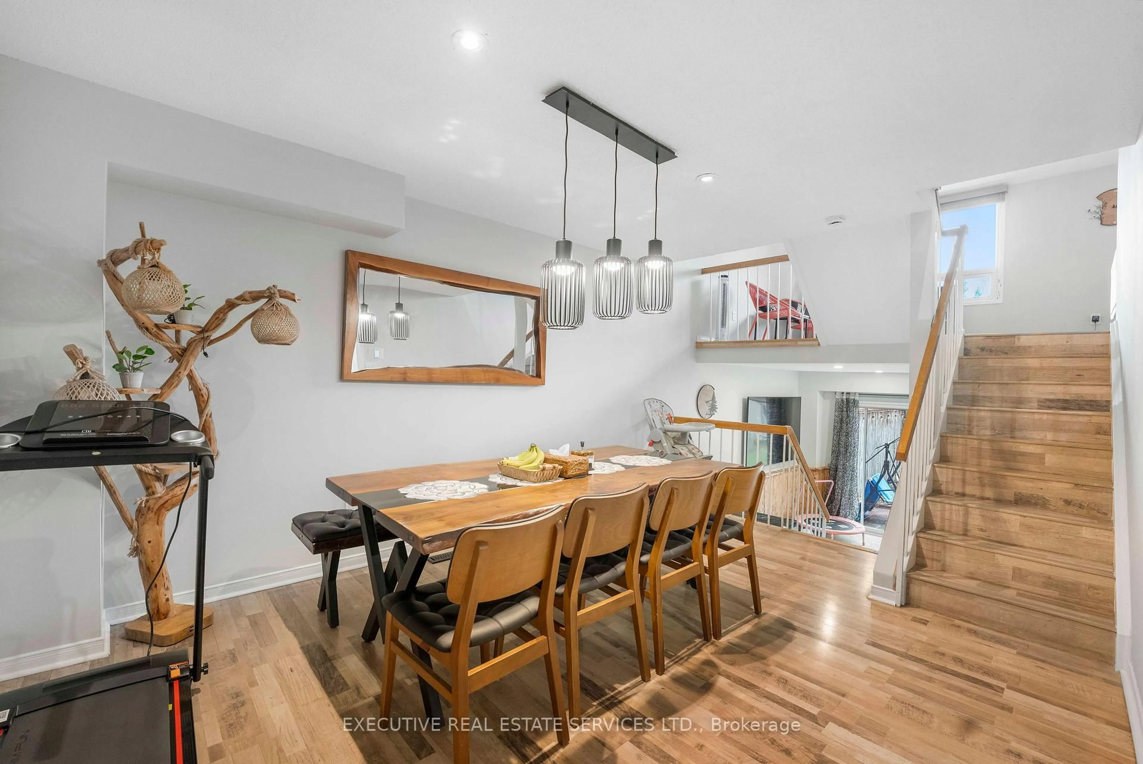 Dining room, wood/laminate floor for 21 Garden Ave, Brampton Ontario L6X 1M4