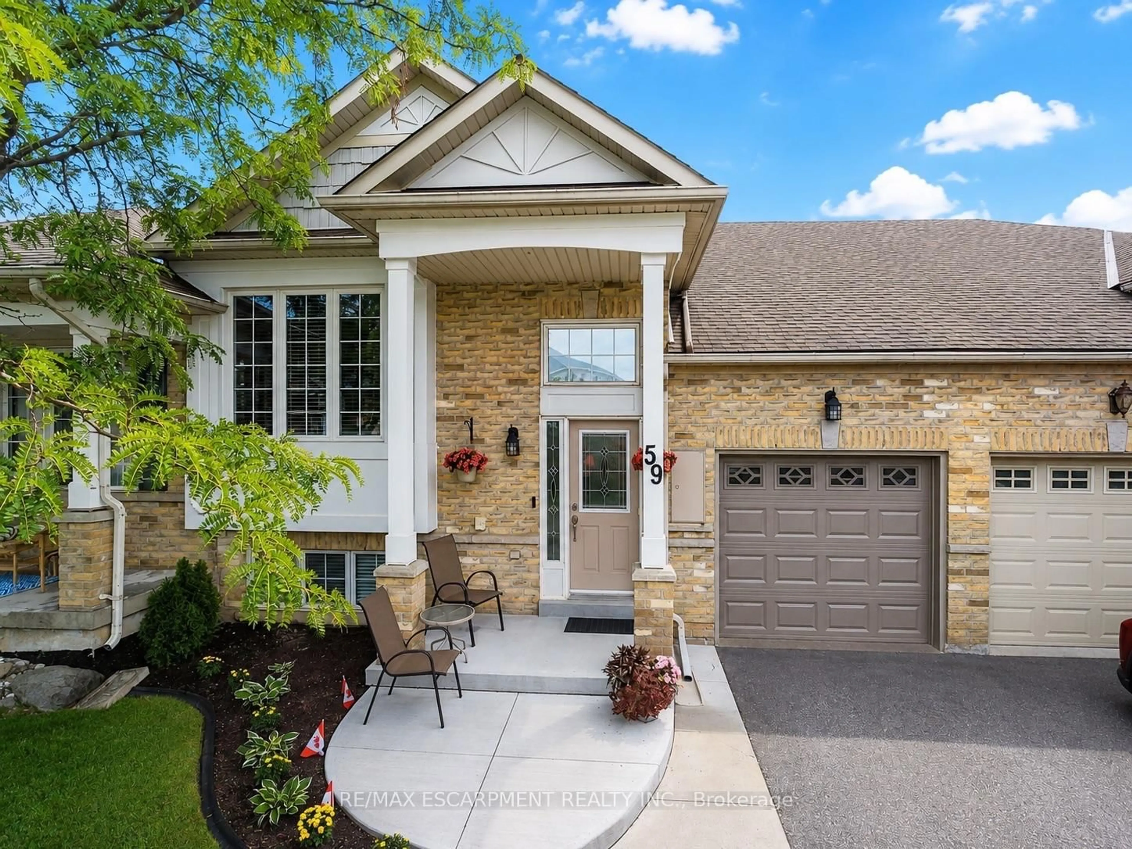 Home with brick exterior material, street for 2243 Turnberry Rd #59, Burlington Ontario L7M 4Y6
