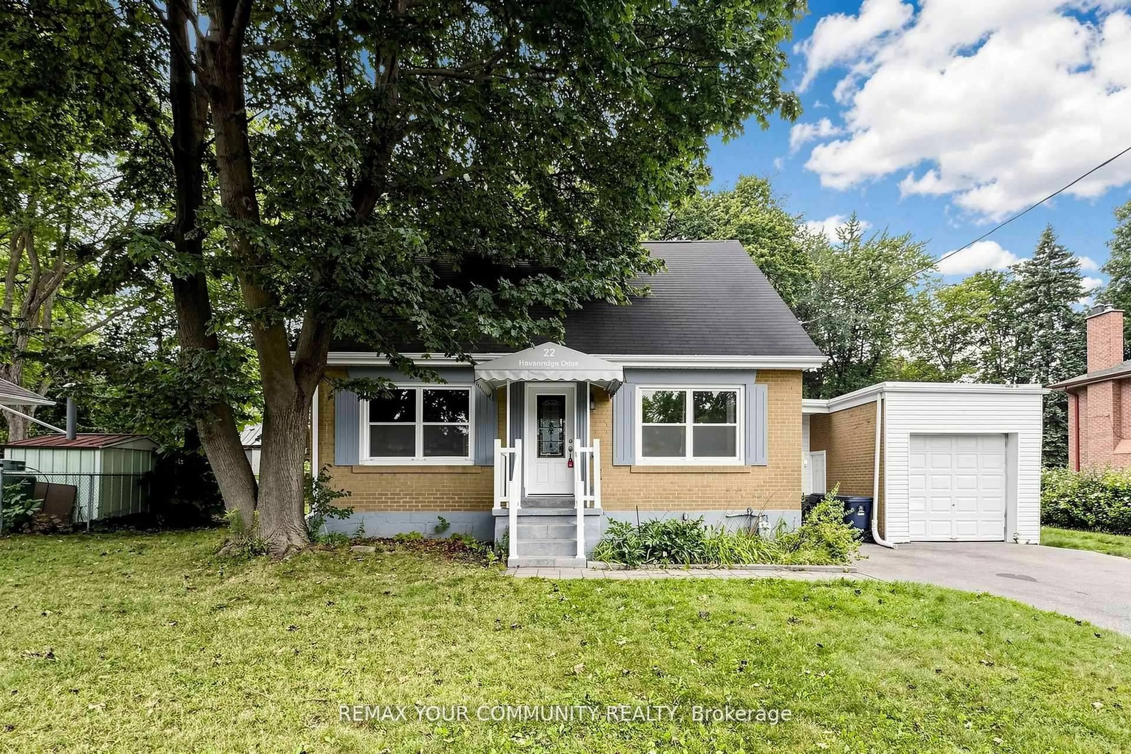 Home with vinyl exterior material, street for 22 Havenridge Dr, Toronto Ontario M9P 3M4