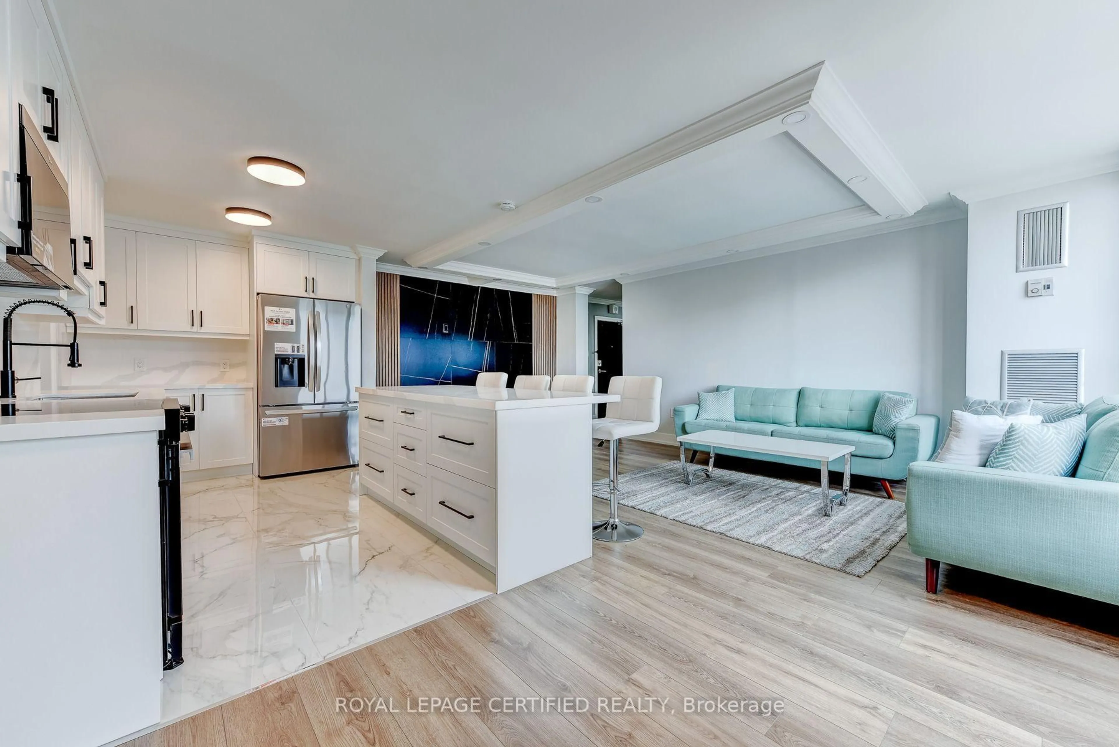 Open concept kitchen, ceramic/tile floor for 3170 Kirwin Ave #301, Mississauga Ontario L5A 3R1
