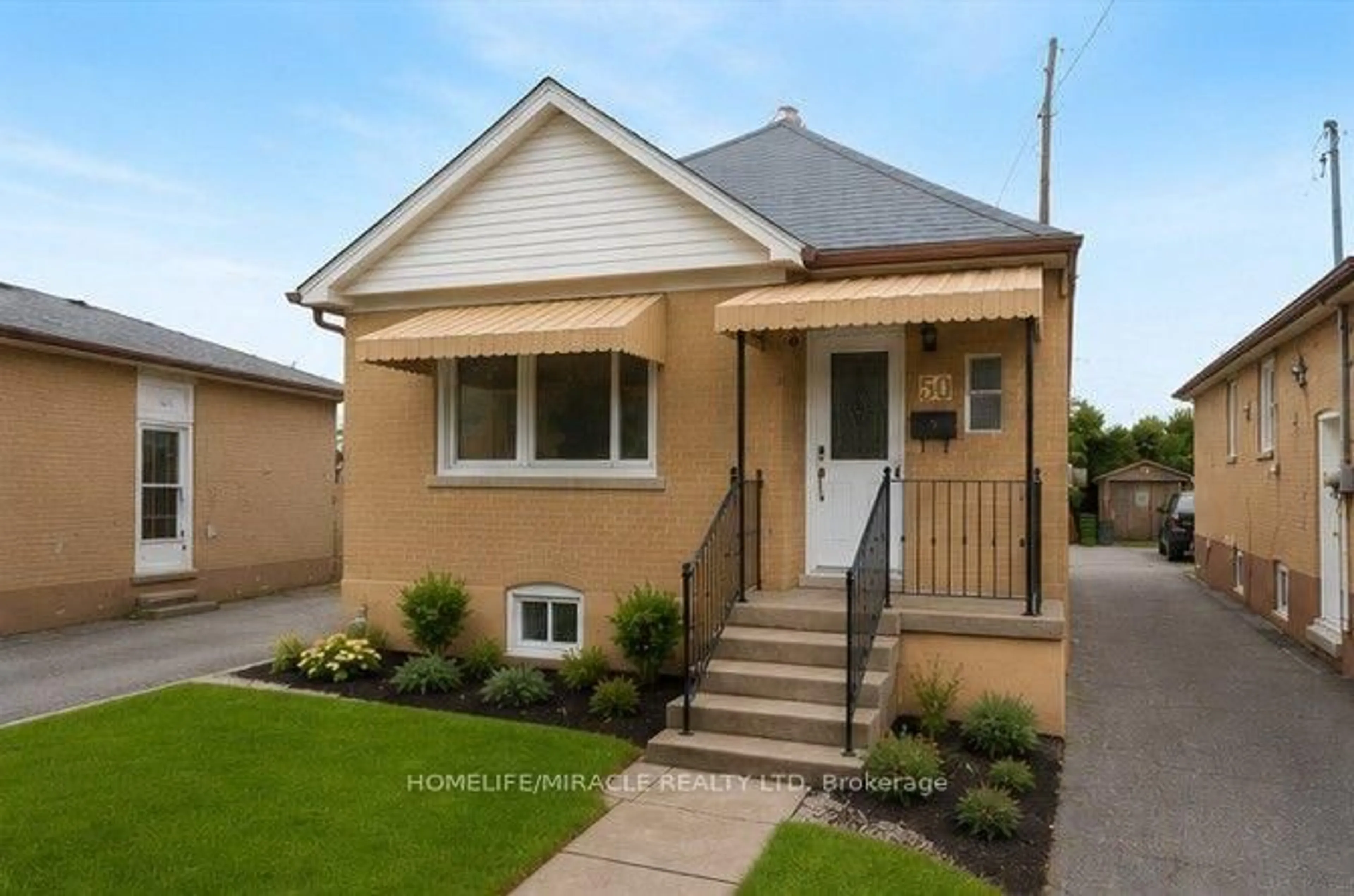 Home with vinyl exterior material, street for 50 Haverson Blvd, Toronto Ontario M6M 3J6