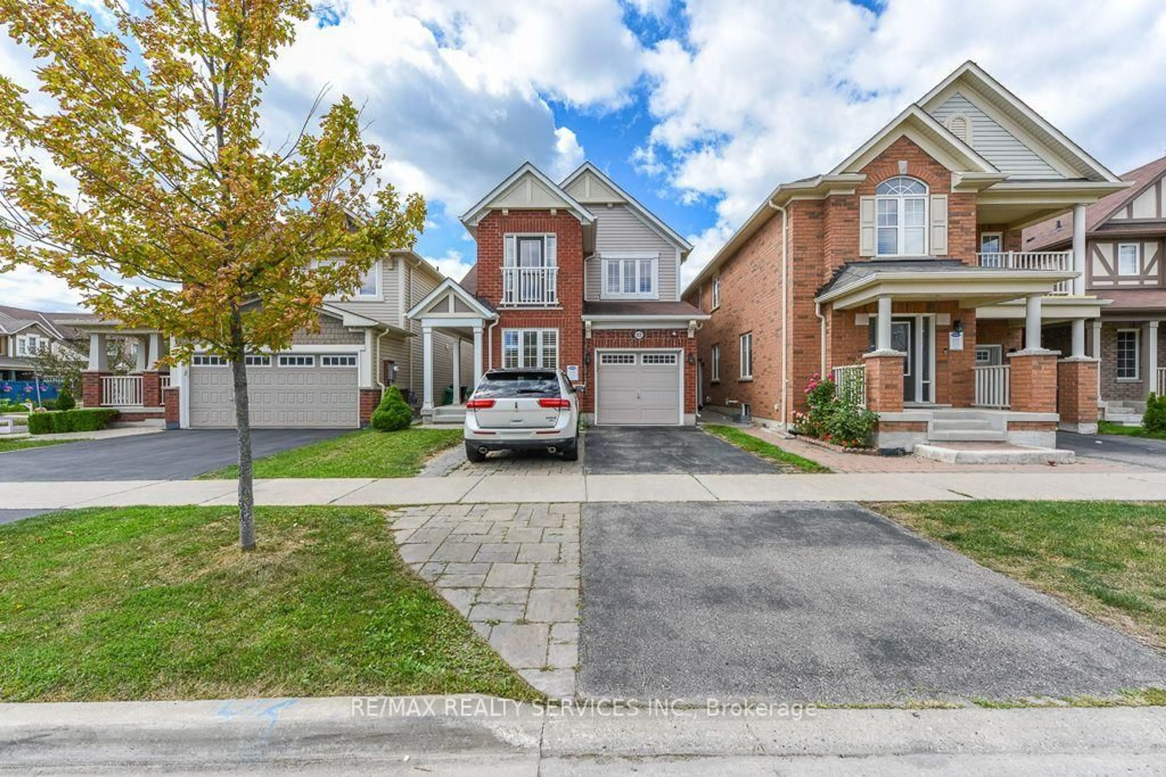 Home with brick exterior material, street for 22 ROBERT PARKINSON Dr, Brampton Ontario L7A 0Y3