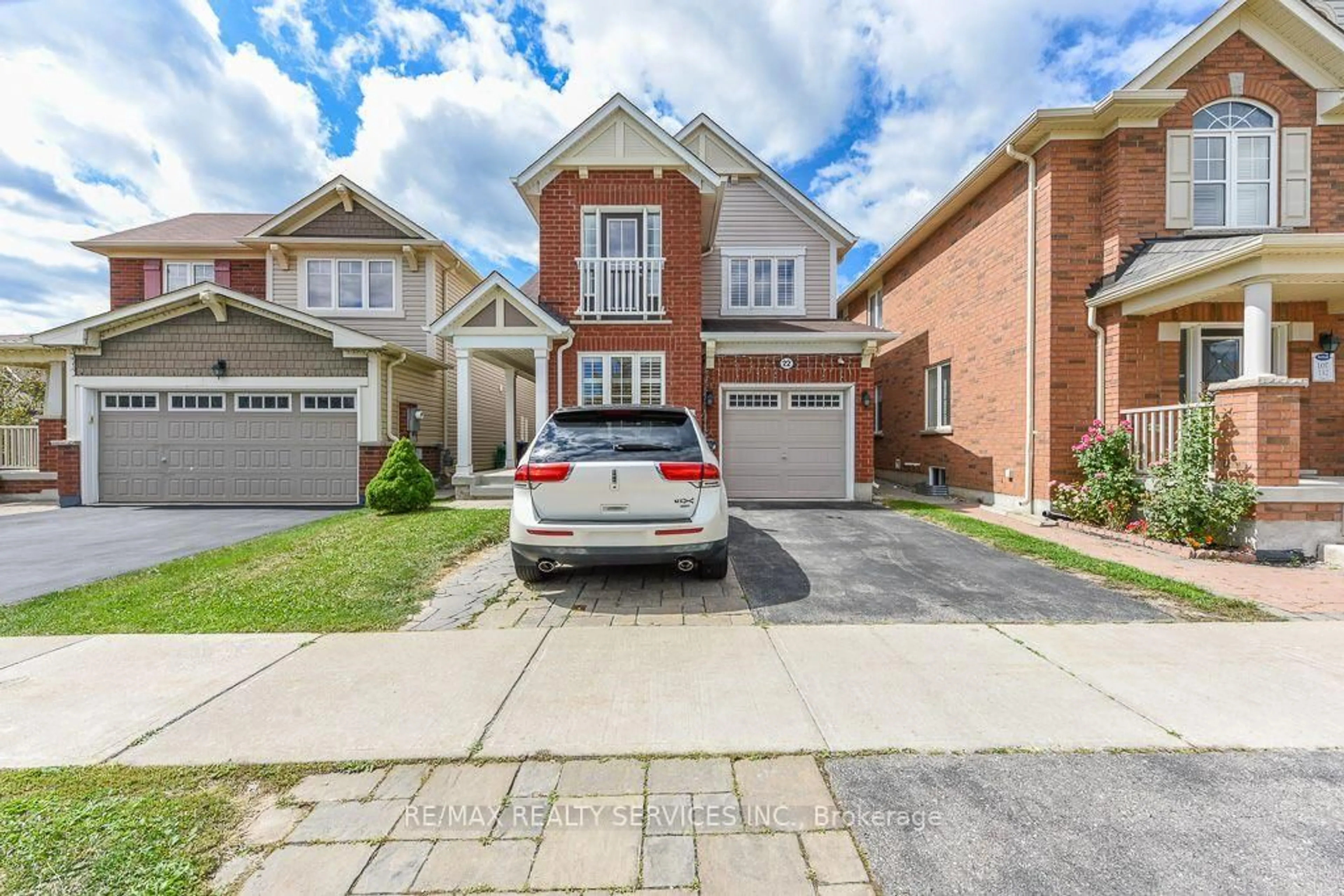 Home with brick exterior material, street for 22 ROBERT PARKINSON Dr, Brampton Ontario L7A 0Y3