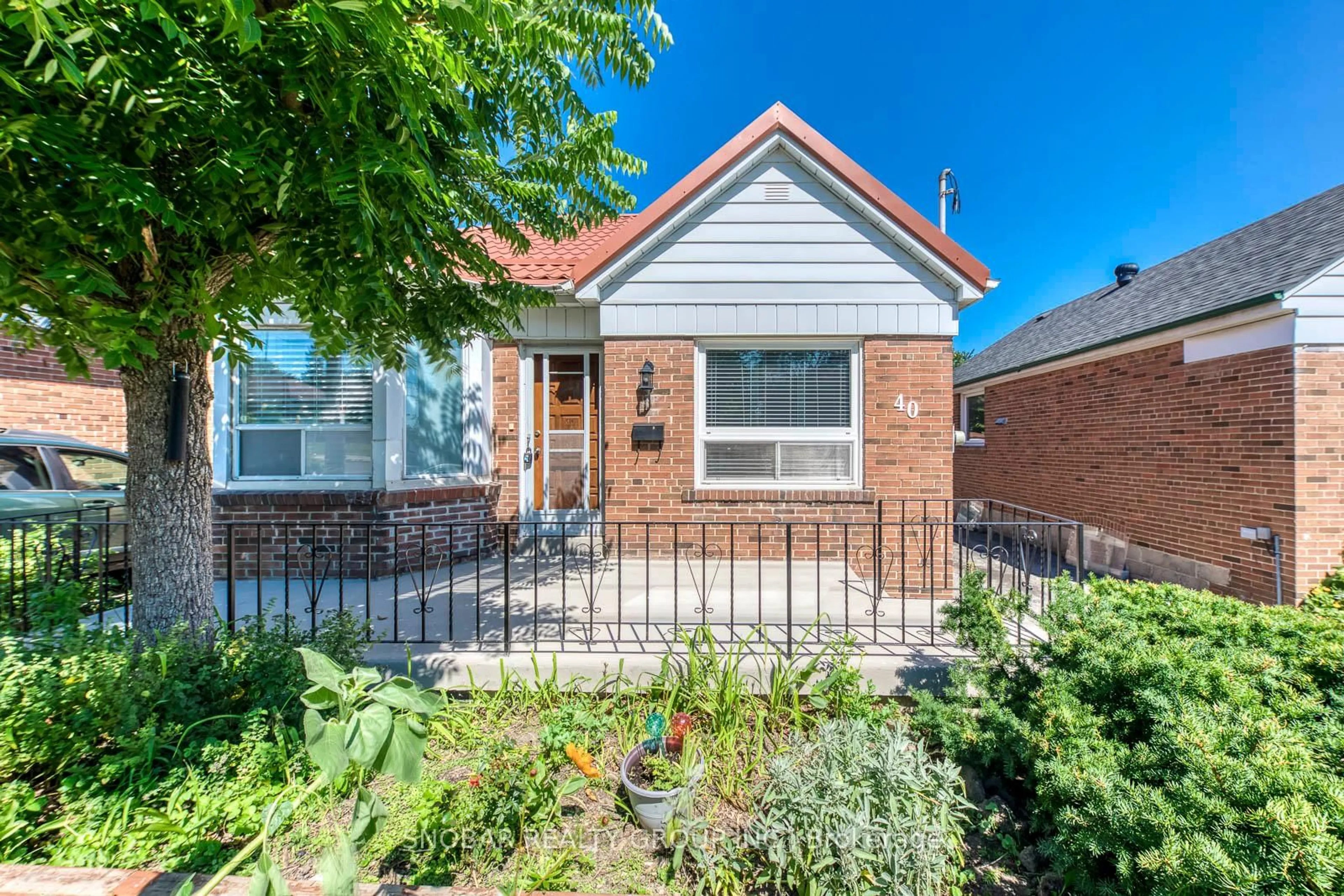 Home with brick exterior material, street for 40 Dixon Rd, Toronto Ontario M9P 2L3
