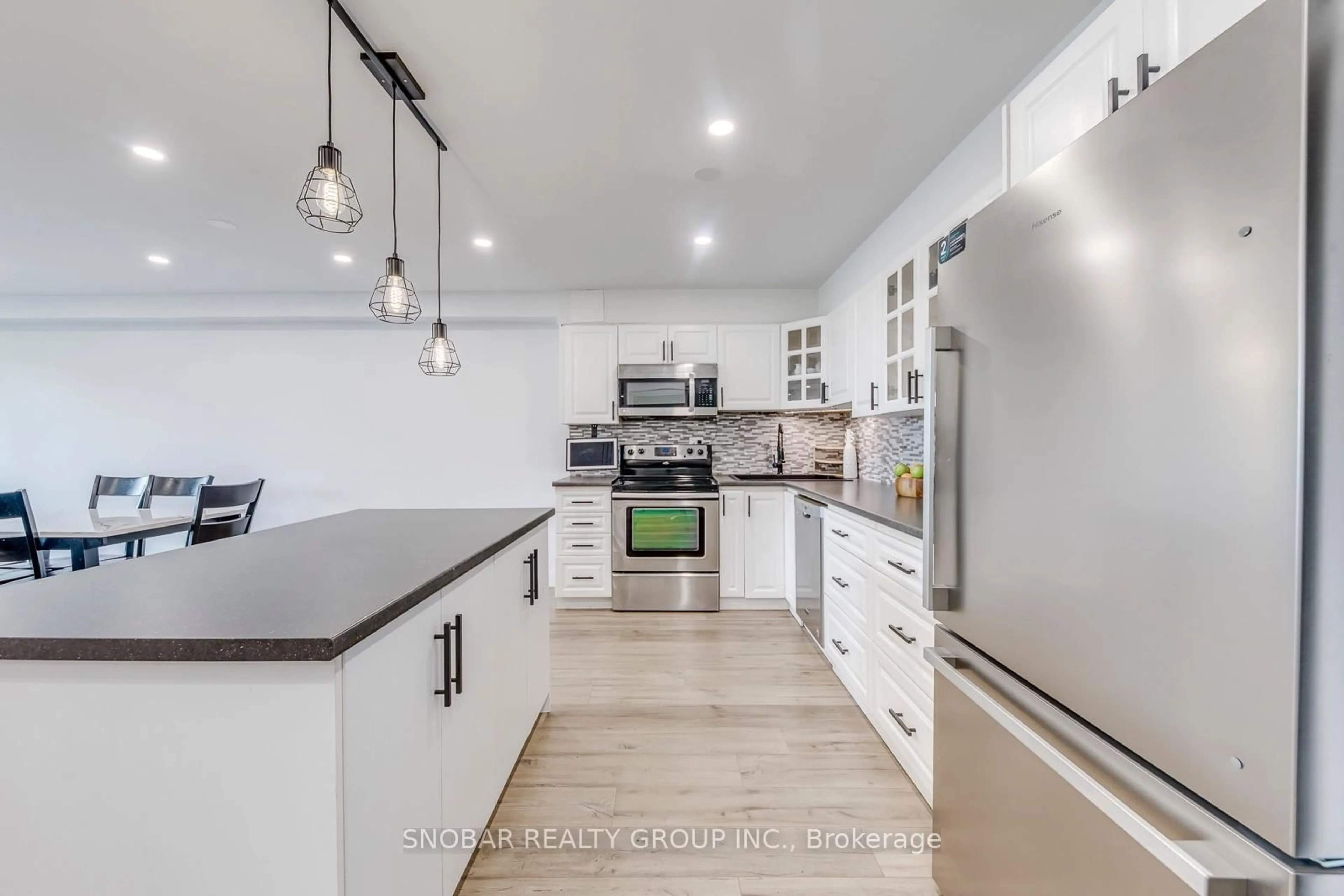 Open concept kitchen, unknown for 15 La Rose Ave #204, Toronto Ontario M9P 1A7
