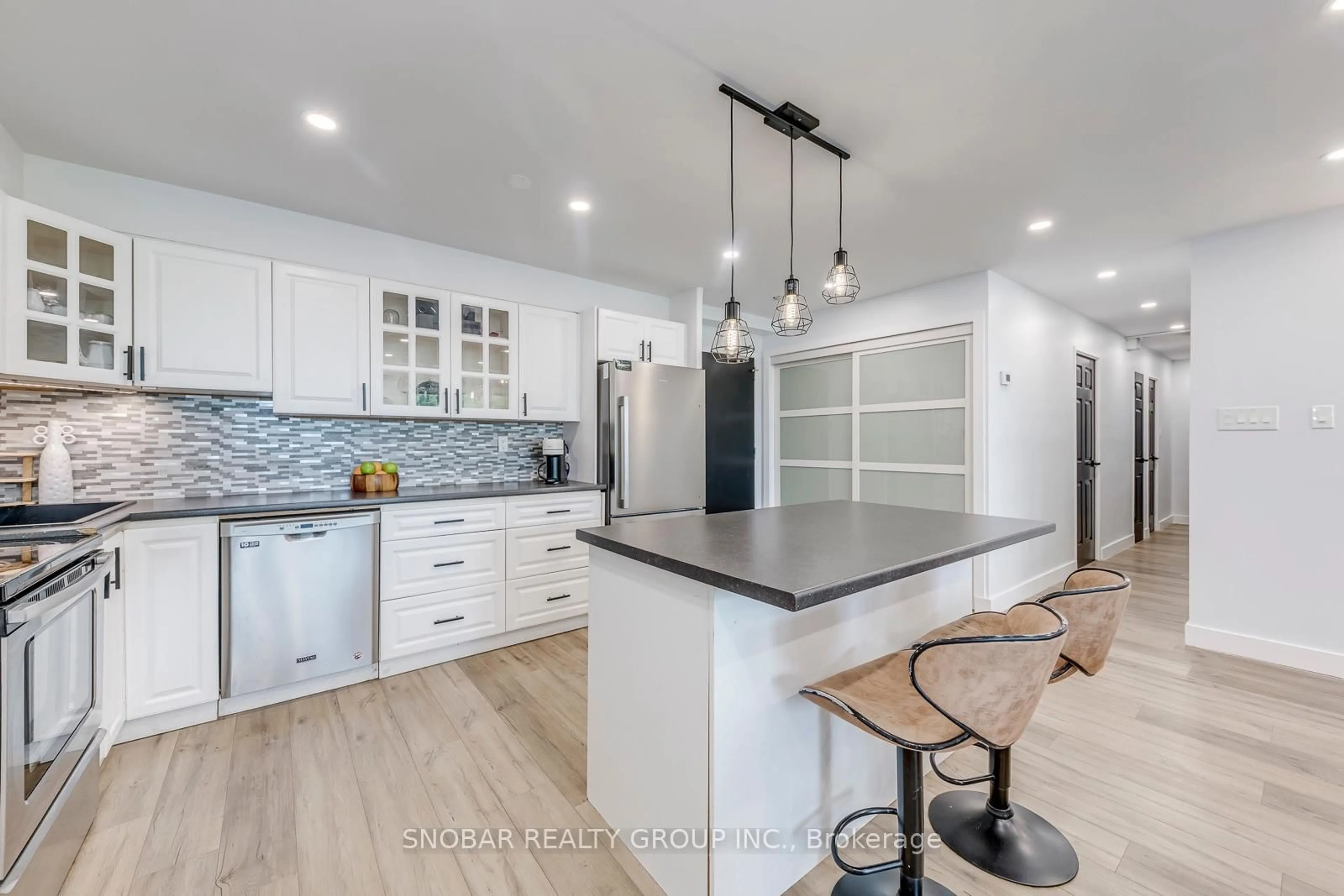 Open concept kitchen, ceramic/tile floor for 15 La Rose Ave #204, Toronto Ontario M9P 1A7