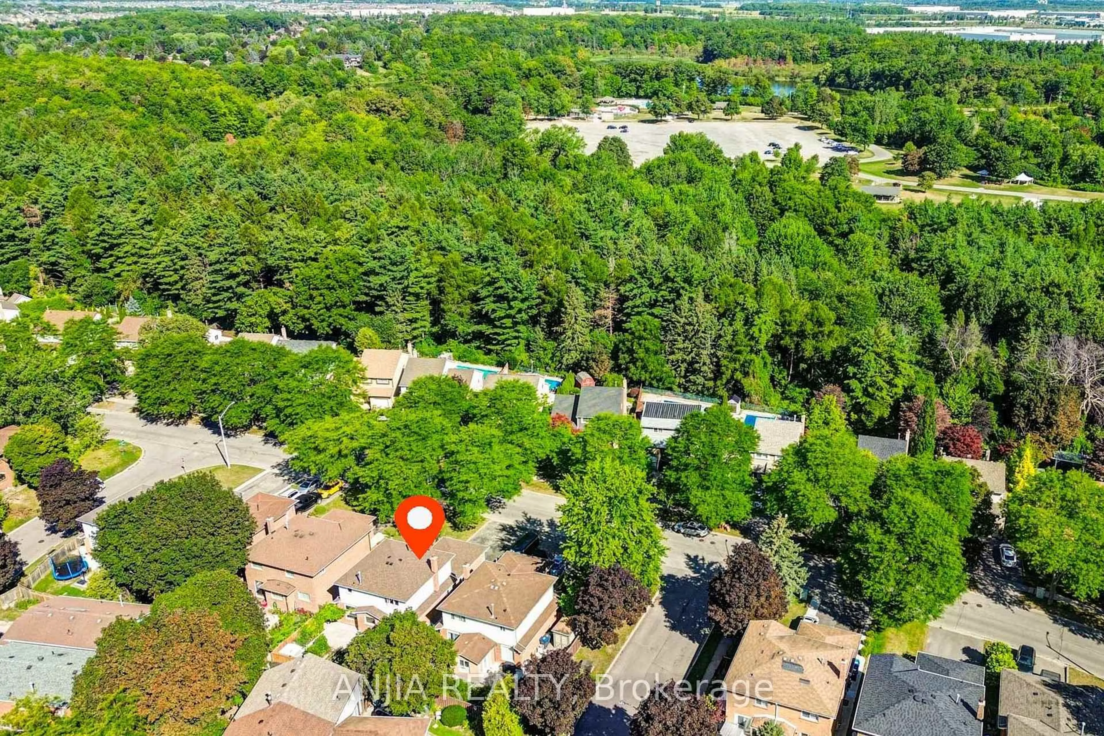 A pic from outside/outdoor area/front of a property/back of a property/a pic from drone, forest/trees view for 77 Royal Palm Dr, Brampton Ontario L6Z 1P2