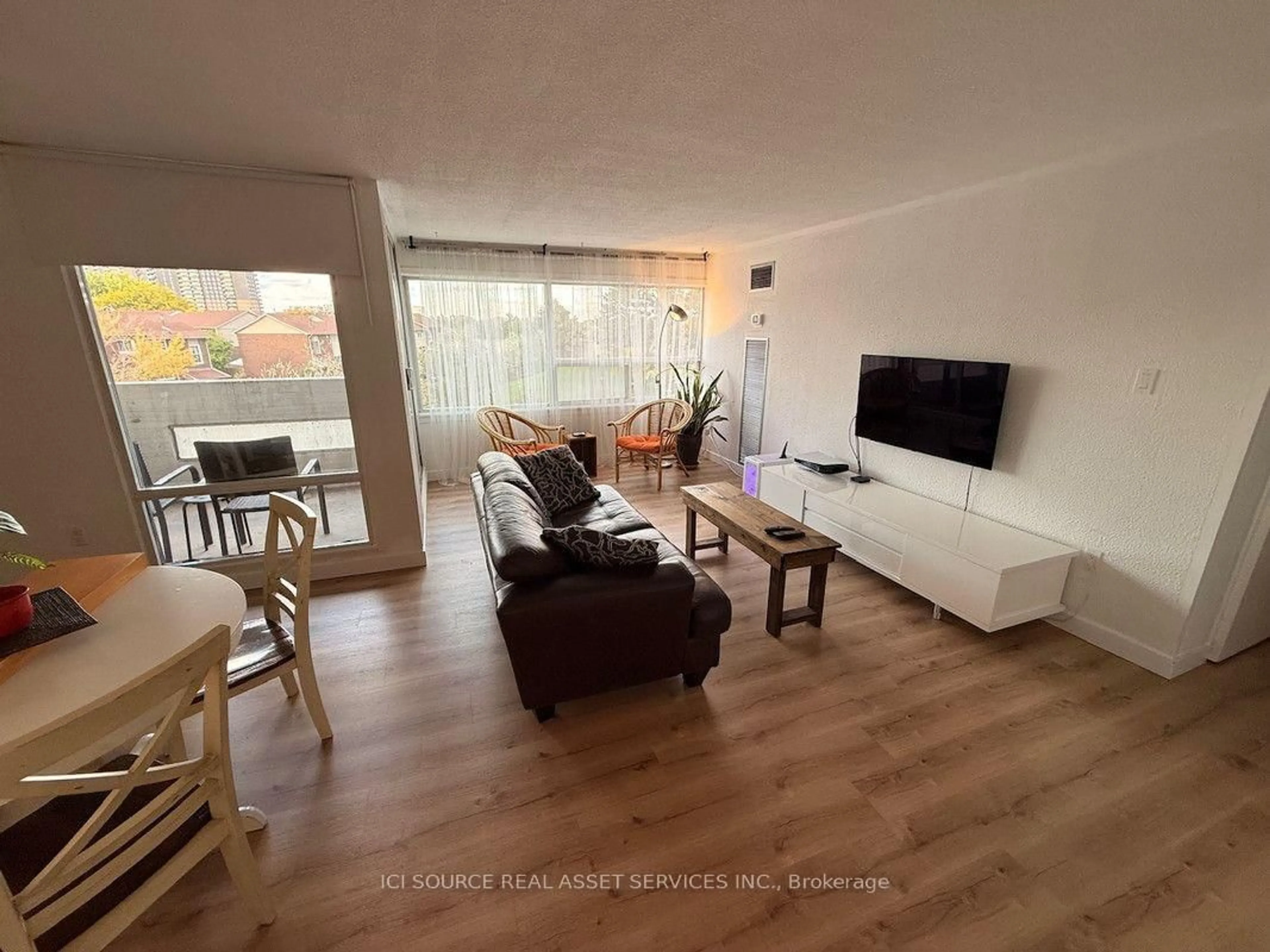 Living room with furniture, unknown for 475 The West Mall #310, Toronto Ontario M9C 4Z3