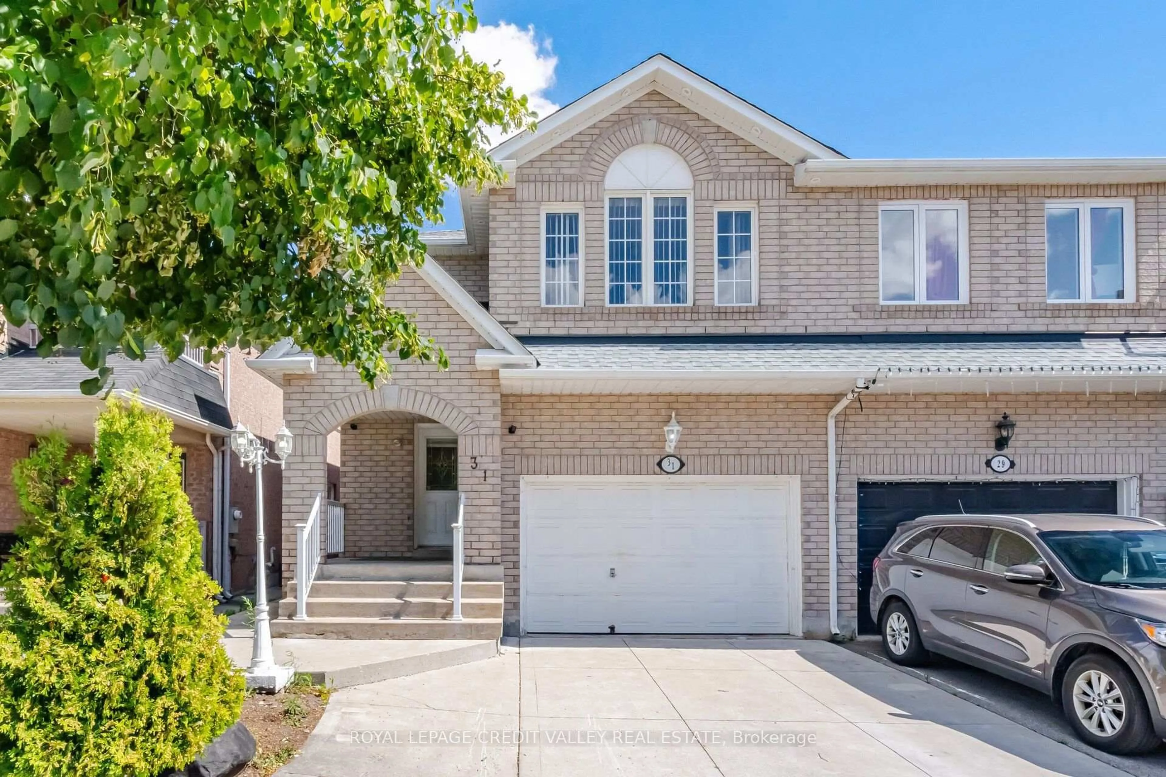 Home with brick exterior material, street for 31 Capistro St, Brampton Ontario L7A 3H6