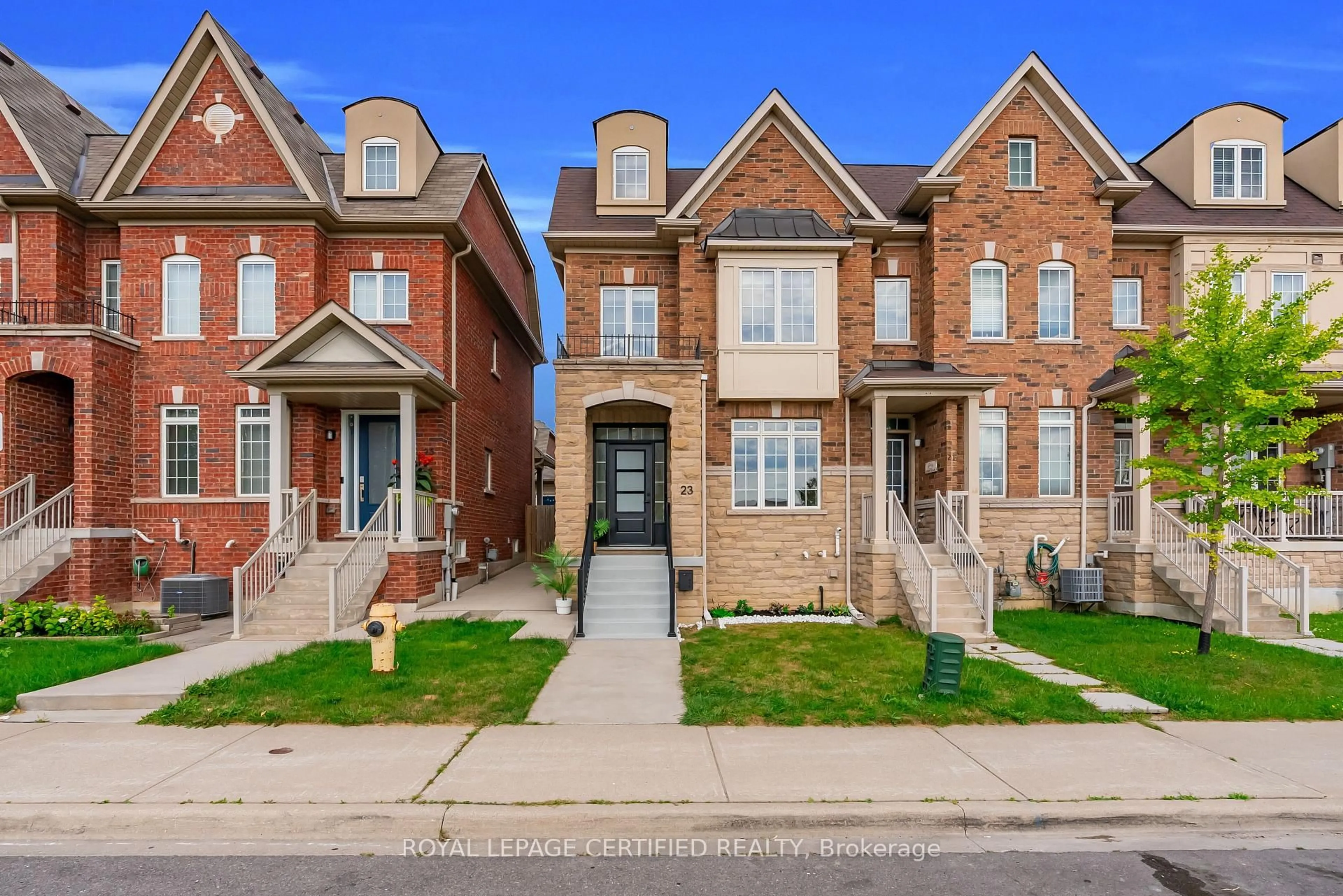 Home with brick exterior material, street for 23 Charlie Jordan Rd, Toronto Ontario M9M 0B7