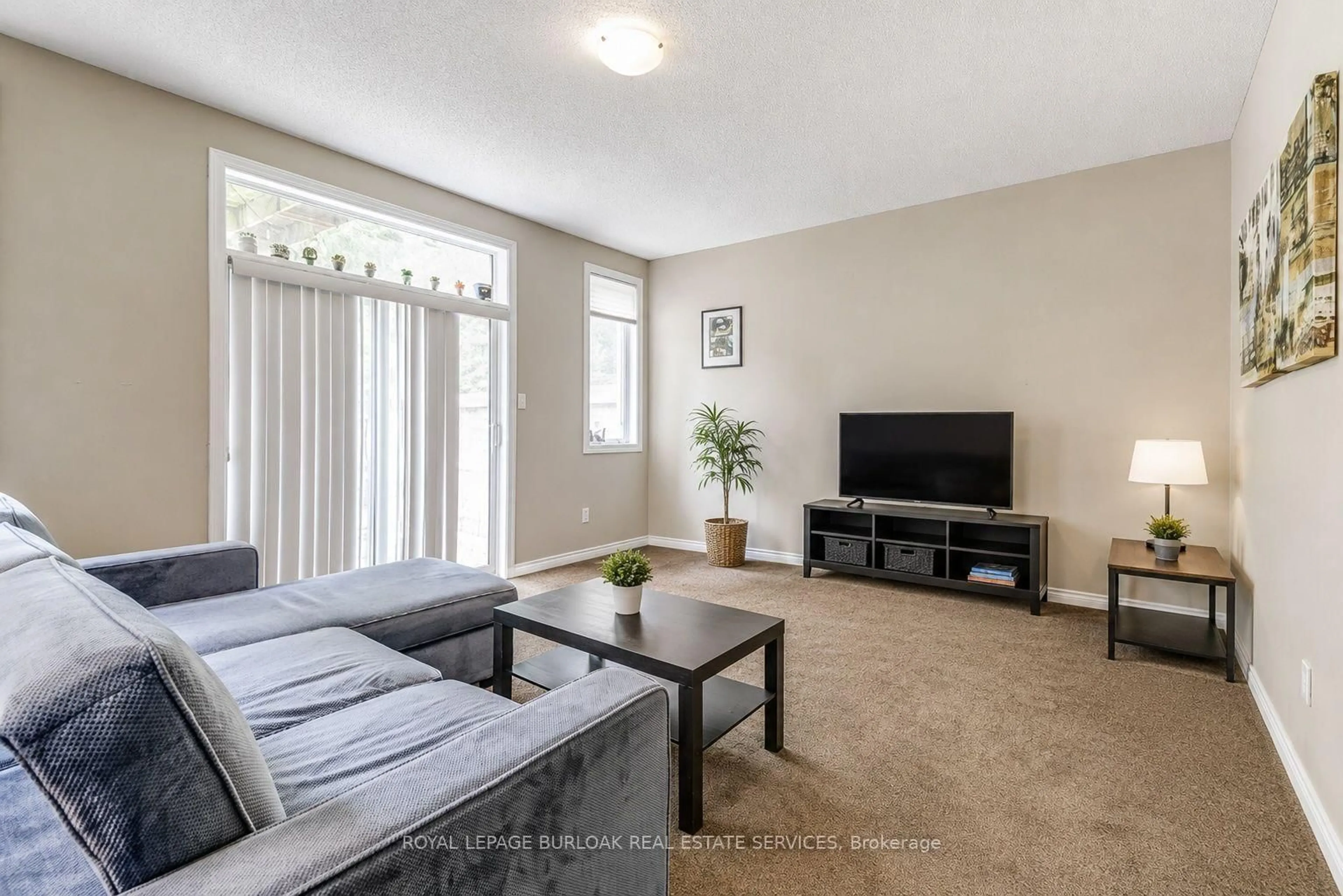 Living room with furniture, unknown for 4165 Upper Middle Rd #13, Burlington Ontario L7M 0V4