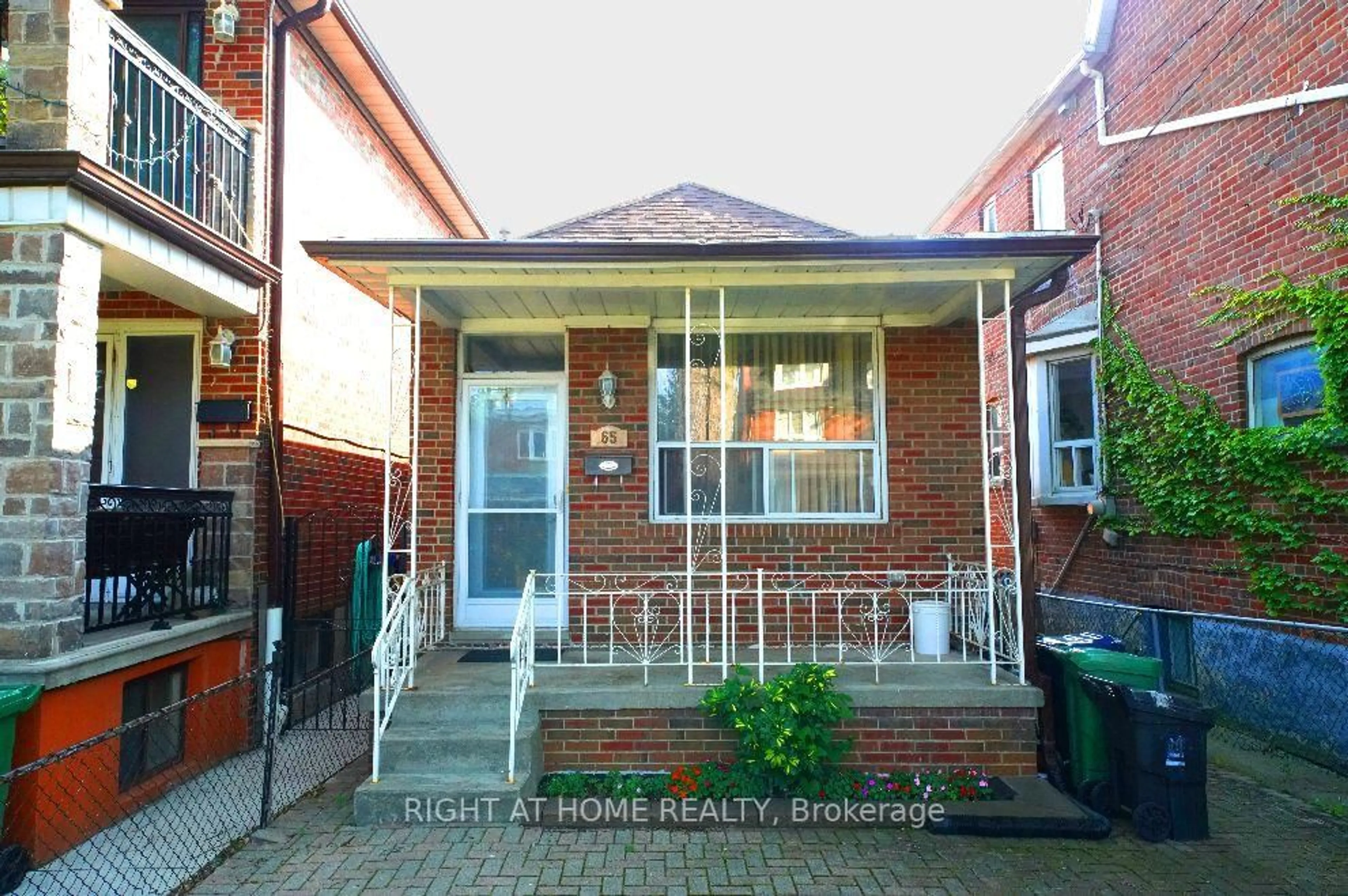 Home with brick exterior material, street for 65 Salem Ave, Toronto Ontario M6H 3C2