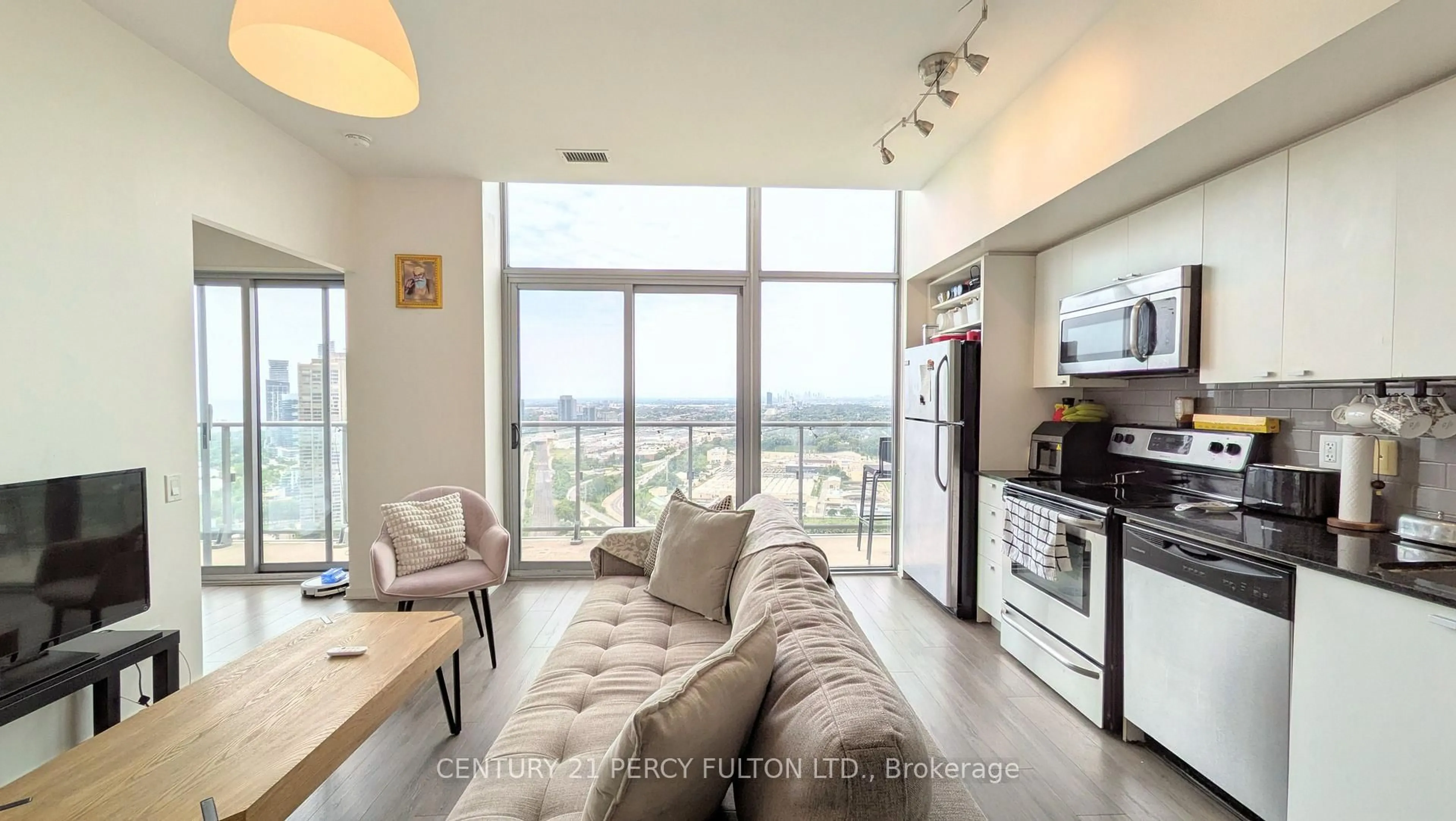 Living room with furniture, unknown for 105 The Queensway #3505, Toronto Ontario M6S 5B5