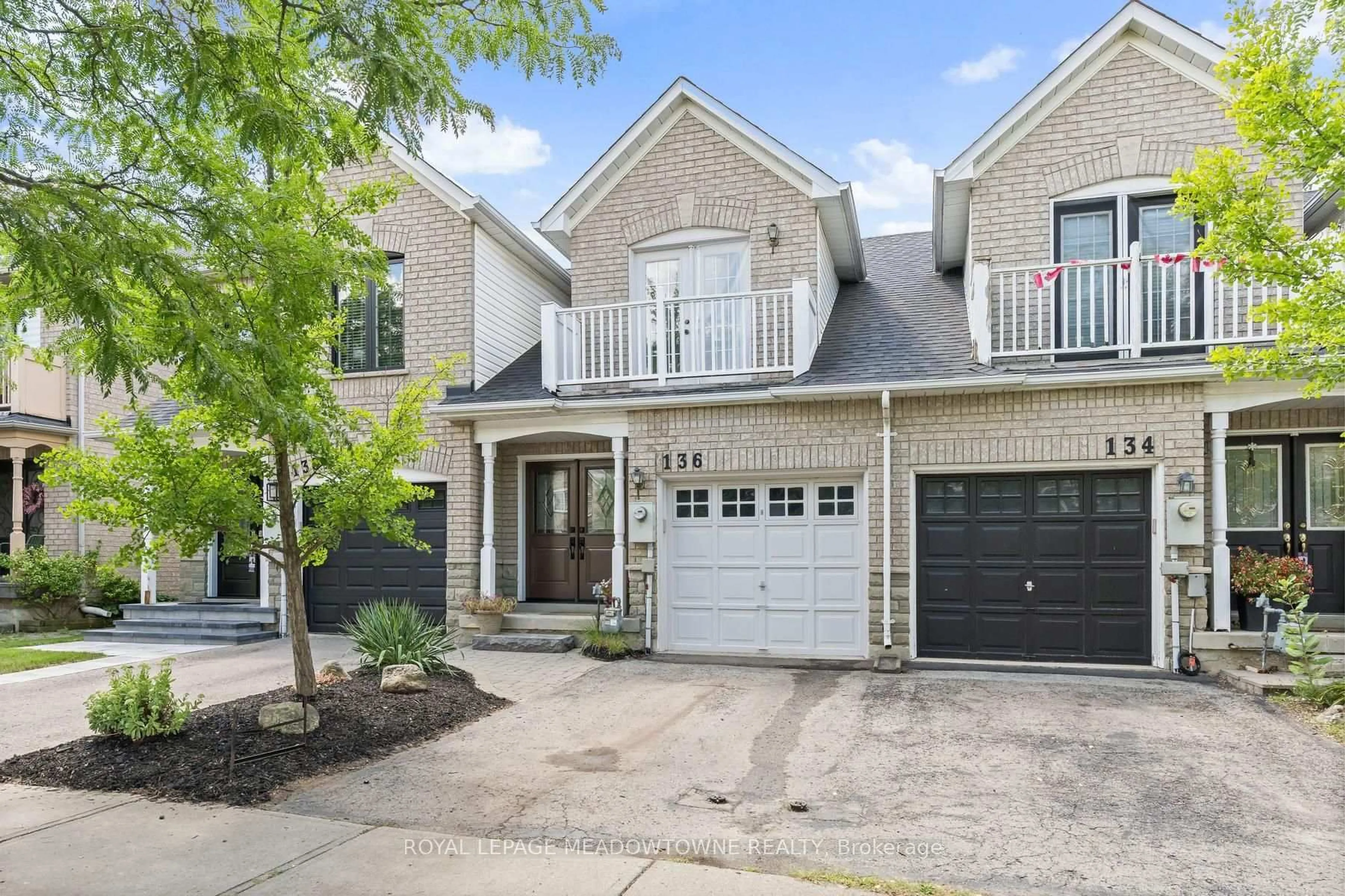Home with brick exterior material, street for 136 Dominion Gardens Dr, Halton Hills Ontario L7G 6B6