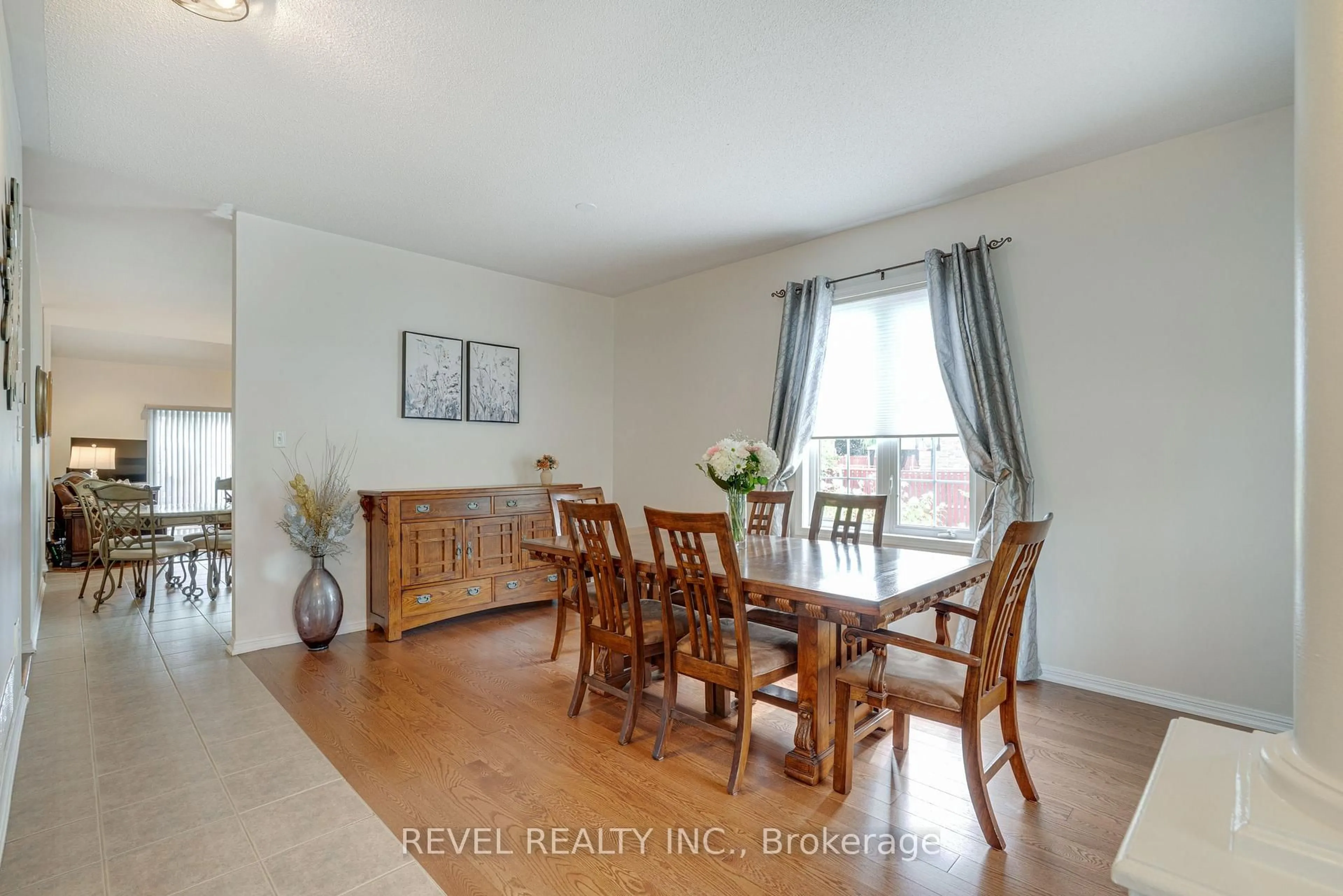 Dining room, wood/laminate floor for 71 Livingston Rd, Milton Ontario L9T 6B8