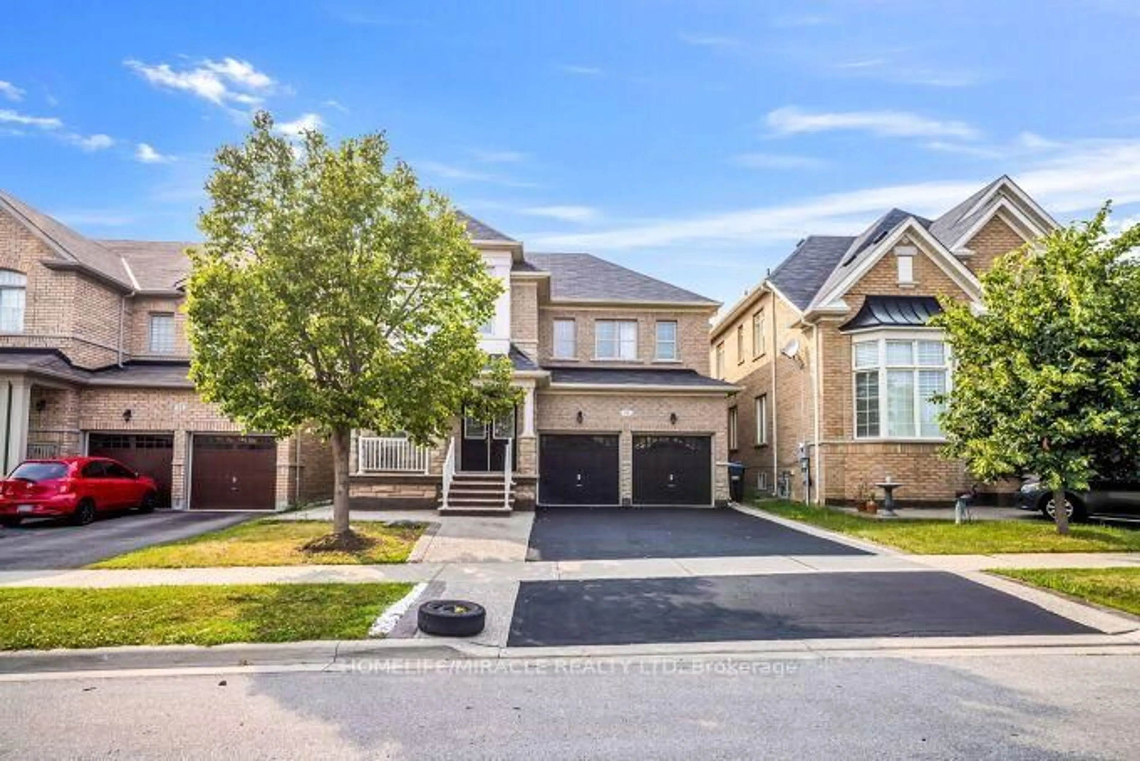 Home with brick exterior material, street for 14 Bonnie Braes Dr, Brampton Ontario L6Y 0X4